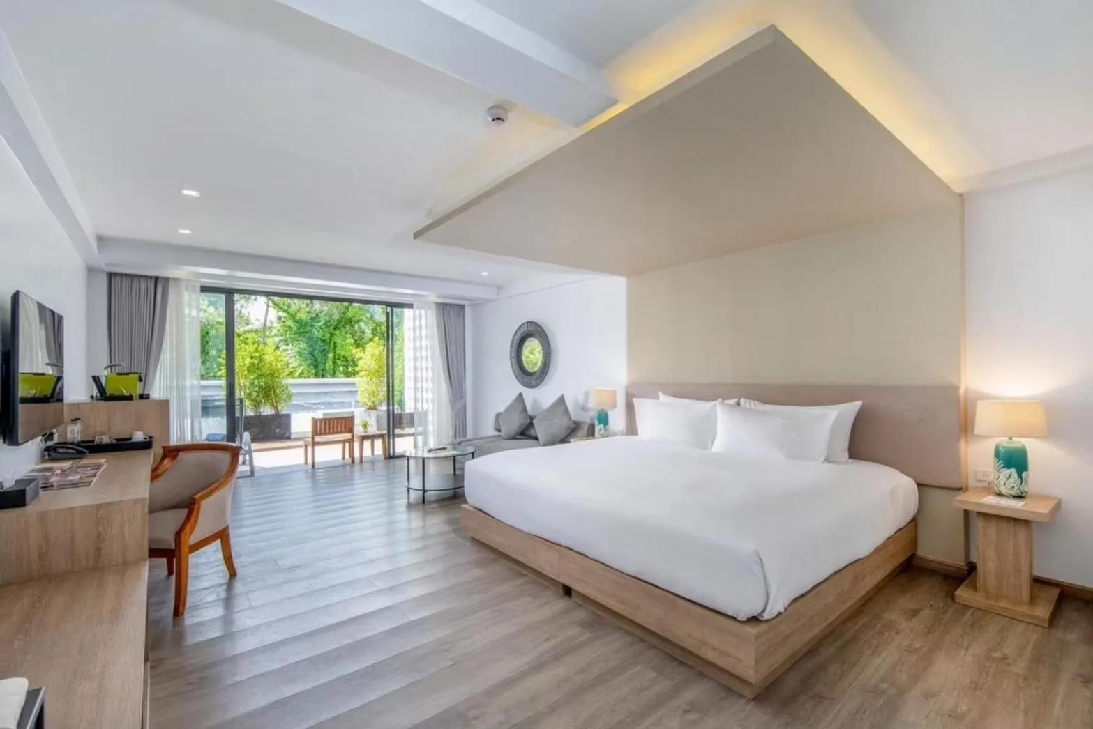Bed in Anona Beachfront Phuket Resort-SHA EXTRA PLUS