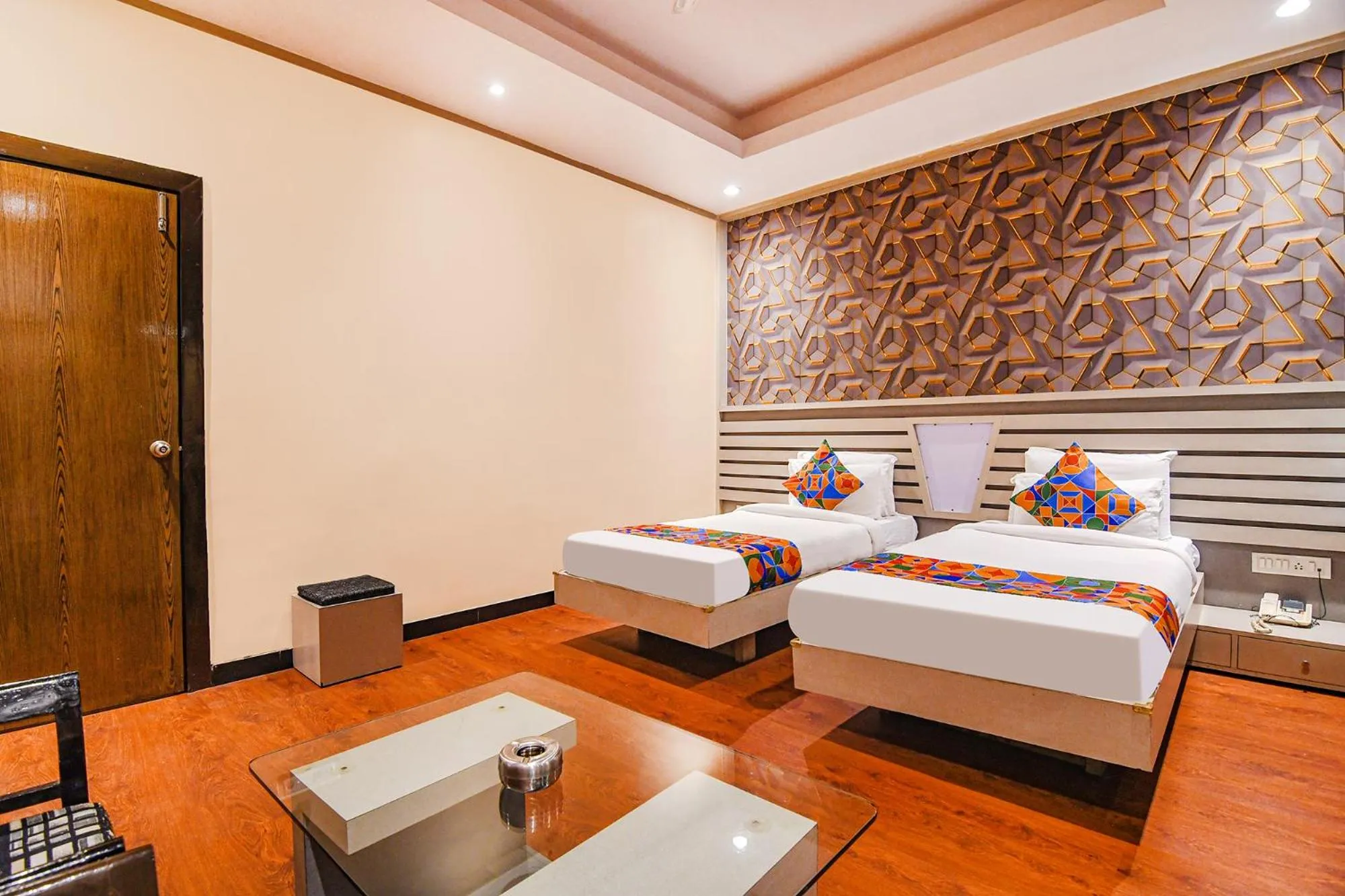 Bed in FabHotel Shivani International