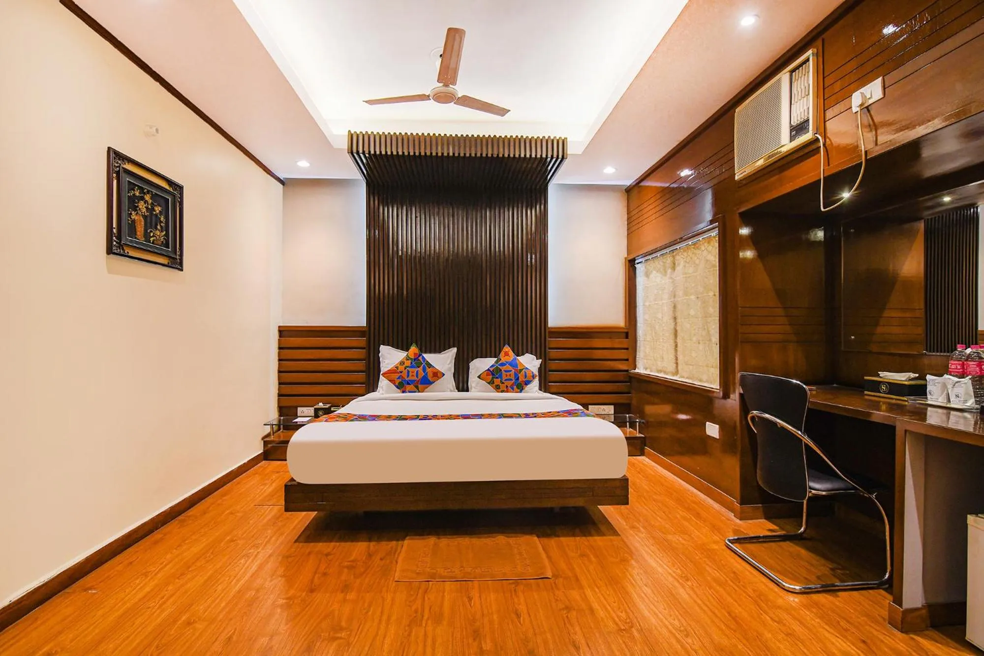 Bed in FabHotel Shivani International