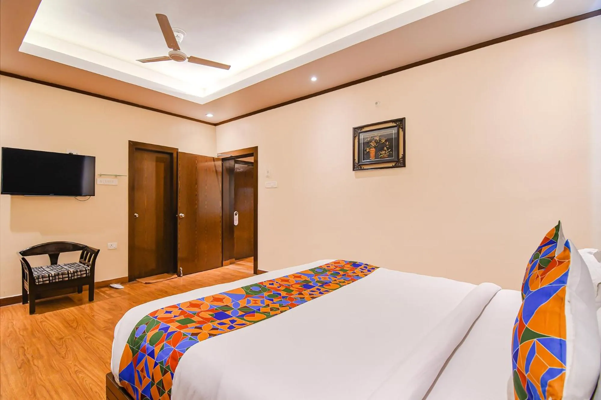 Bed in FabHotel Shivani International