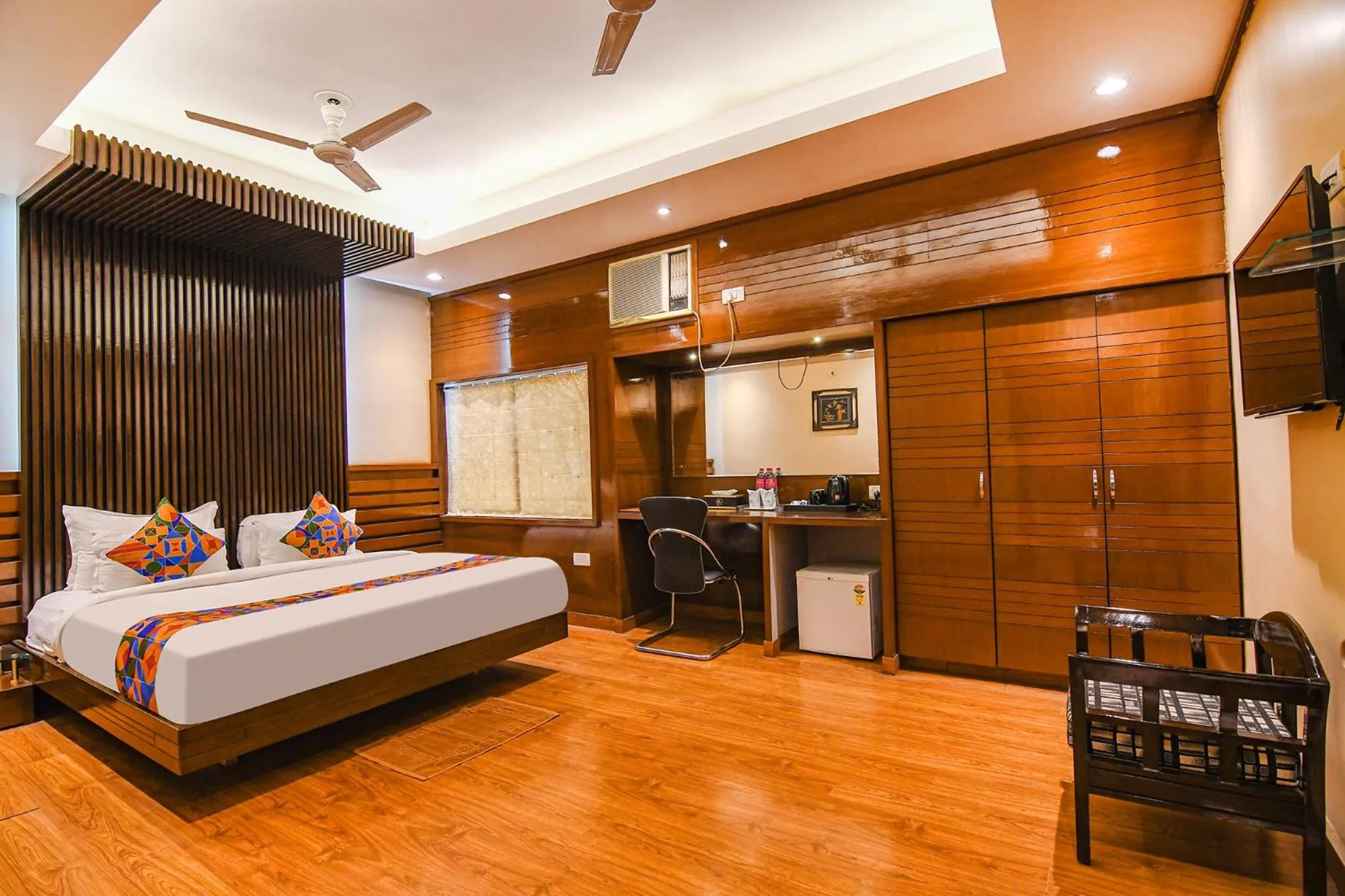 Bed in FabHotel Shivani International