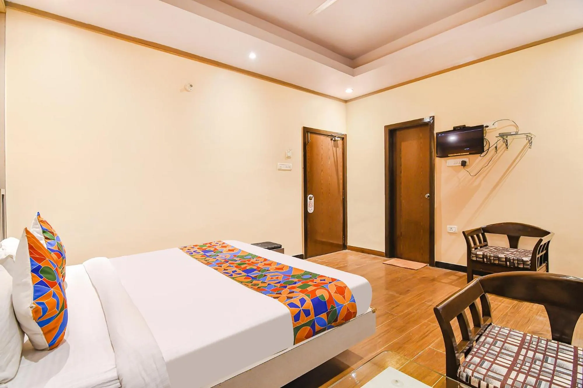 Bed in FabHotel Shivani International