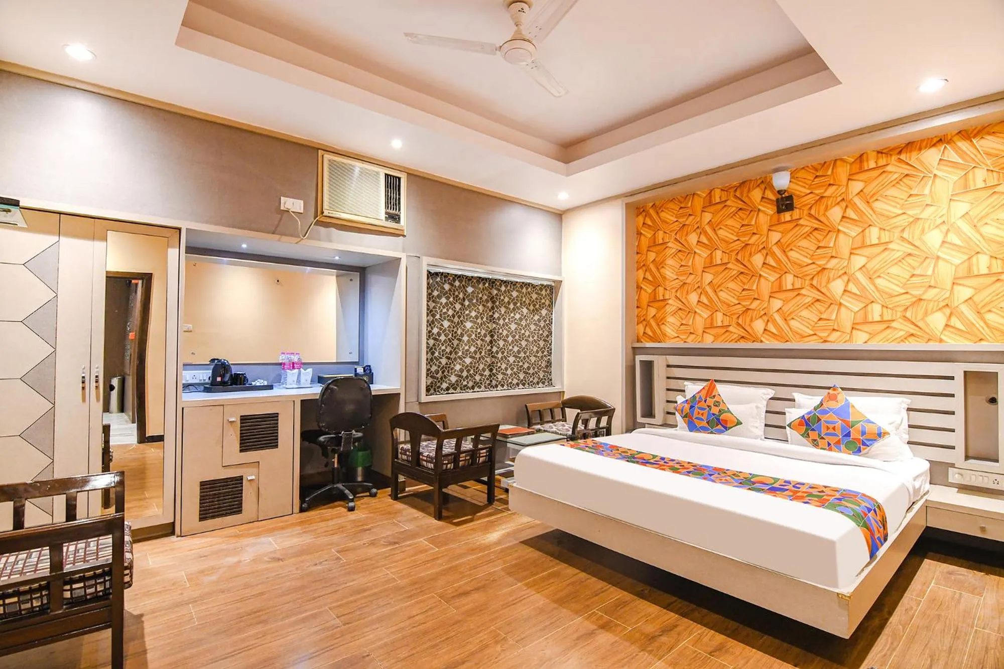 Bed in FabHotel Shivani International