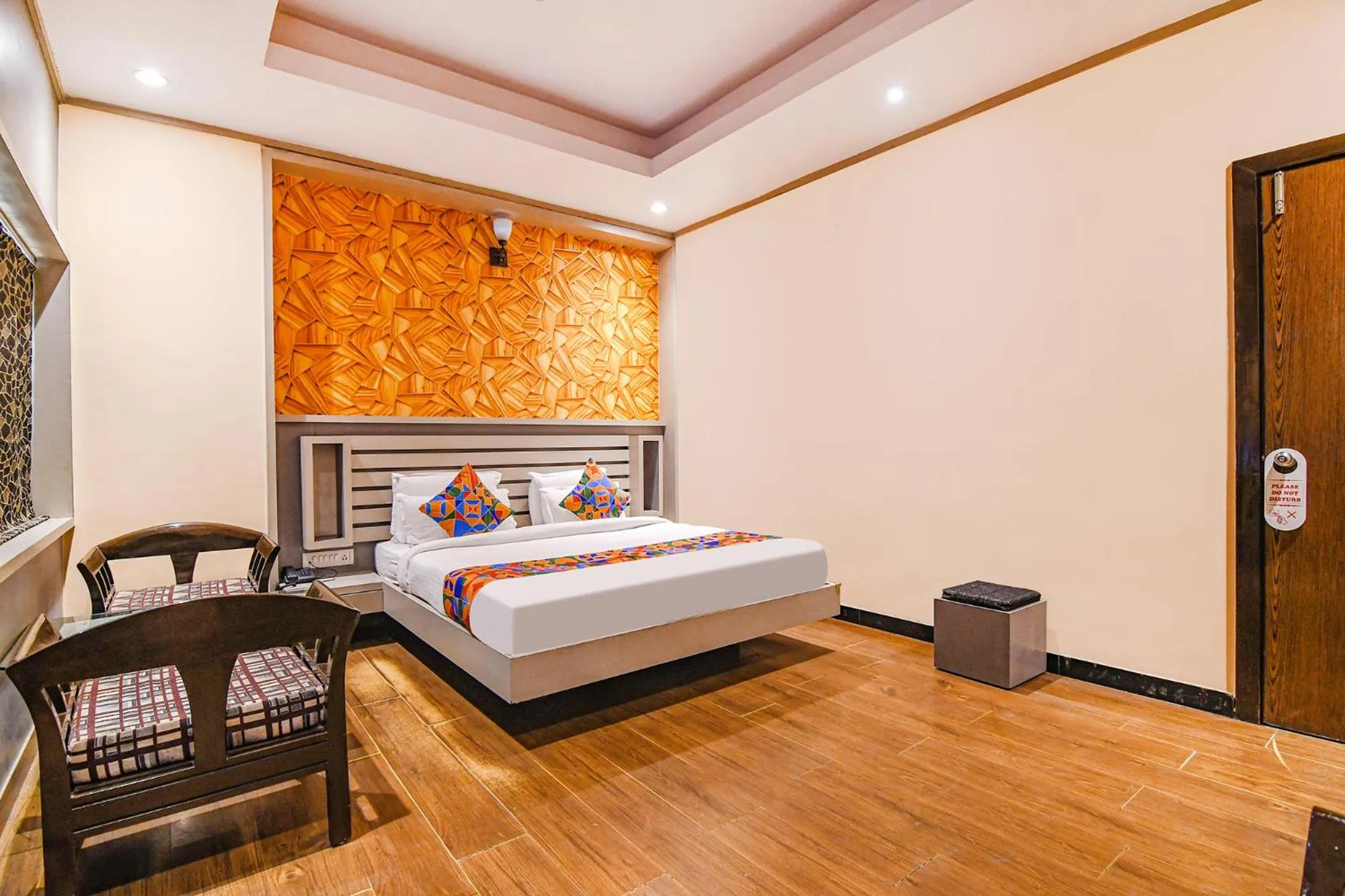 Bed in FabHotel Shivani International