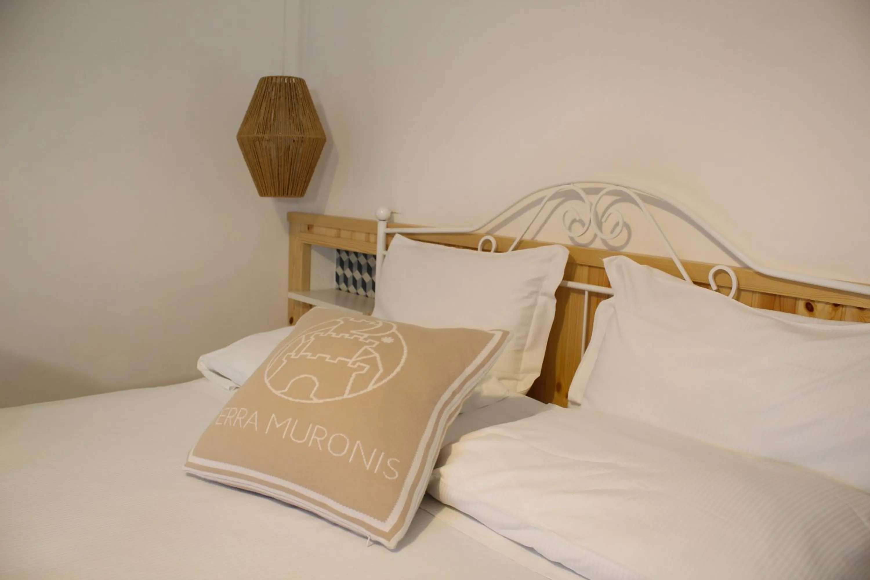 Bed in Terra Muronis Hotel Diffuso