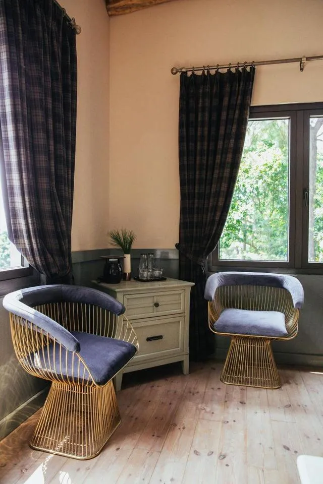 Seating area, Bed in AMAYA HOME - Lodge, Spa & Restaurant