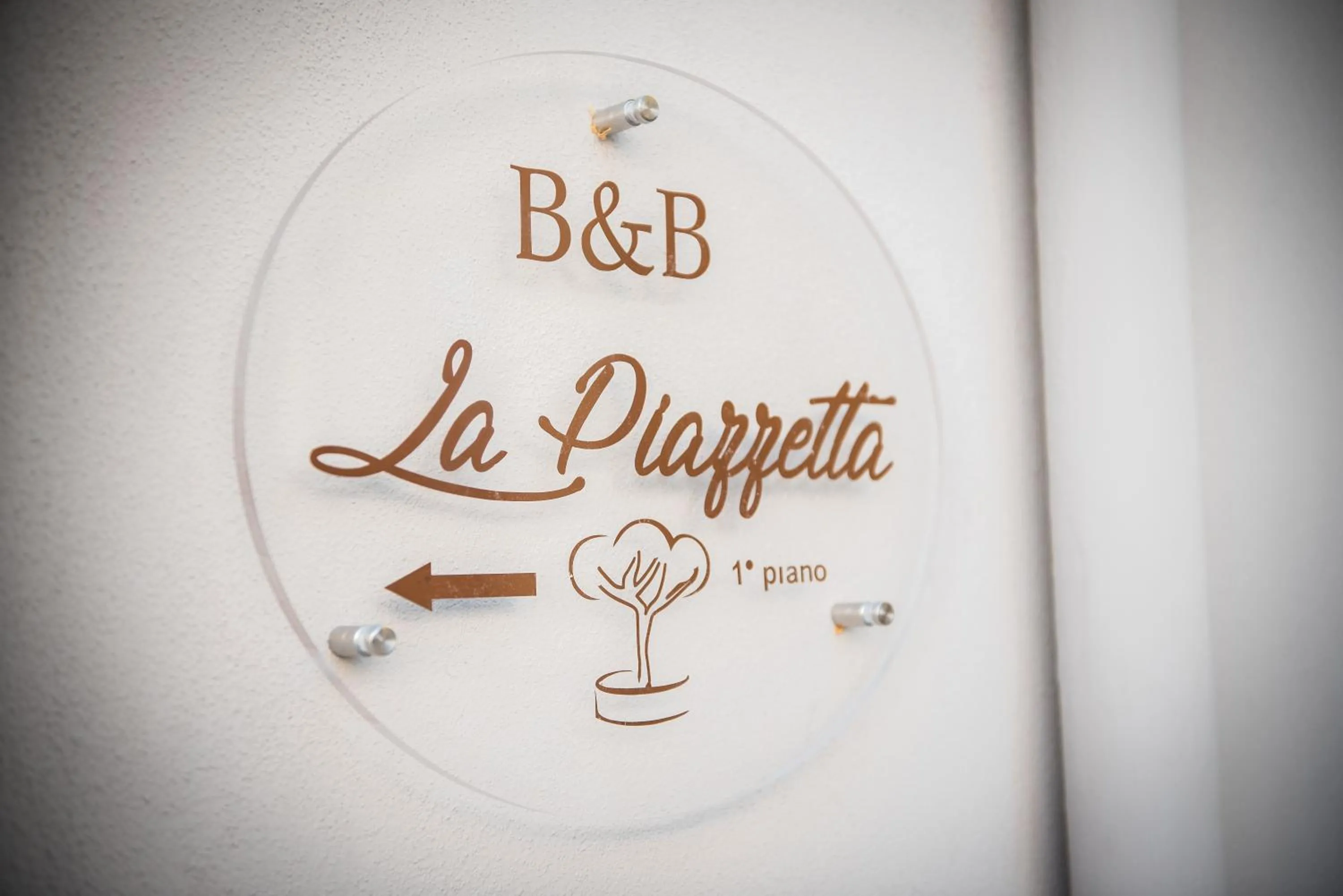 Property logo or sign in B&B La Piazzetta