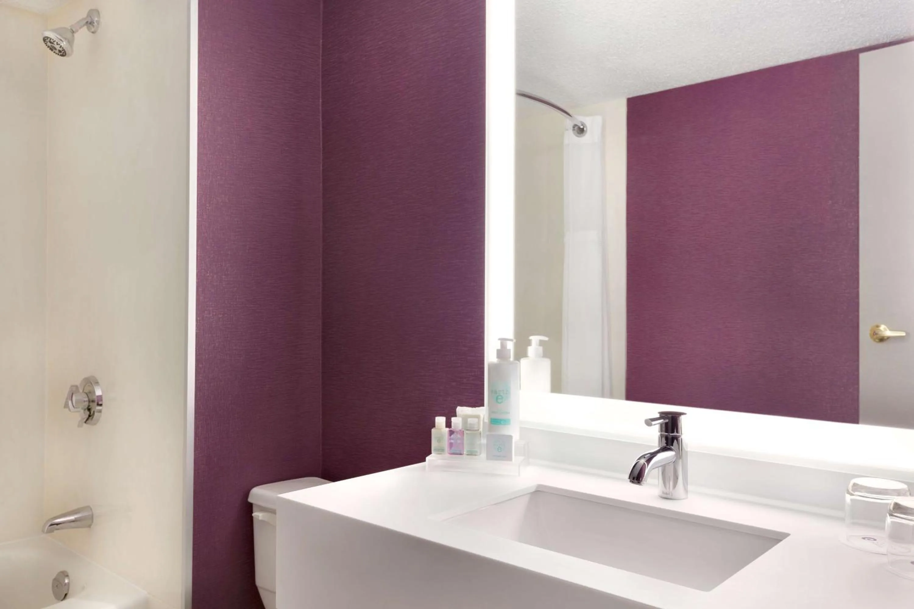 Bathroom in Coast Edmonton Plaza Hotel by APA