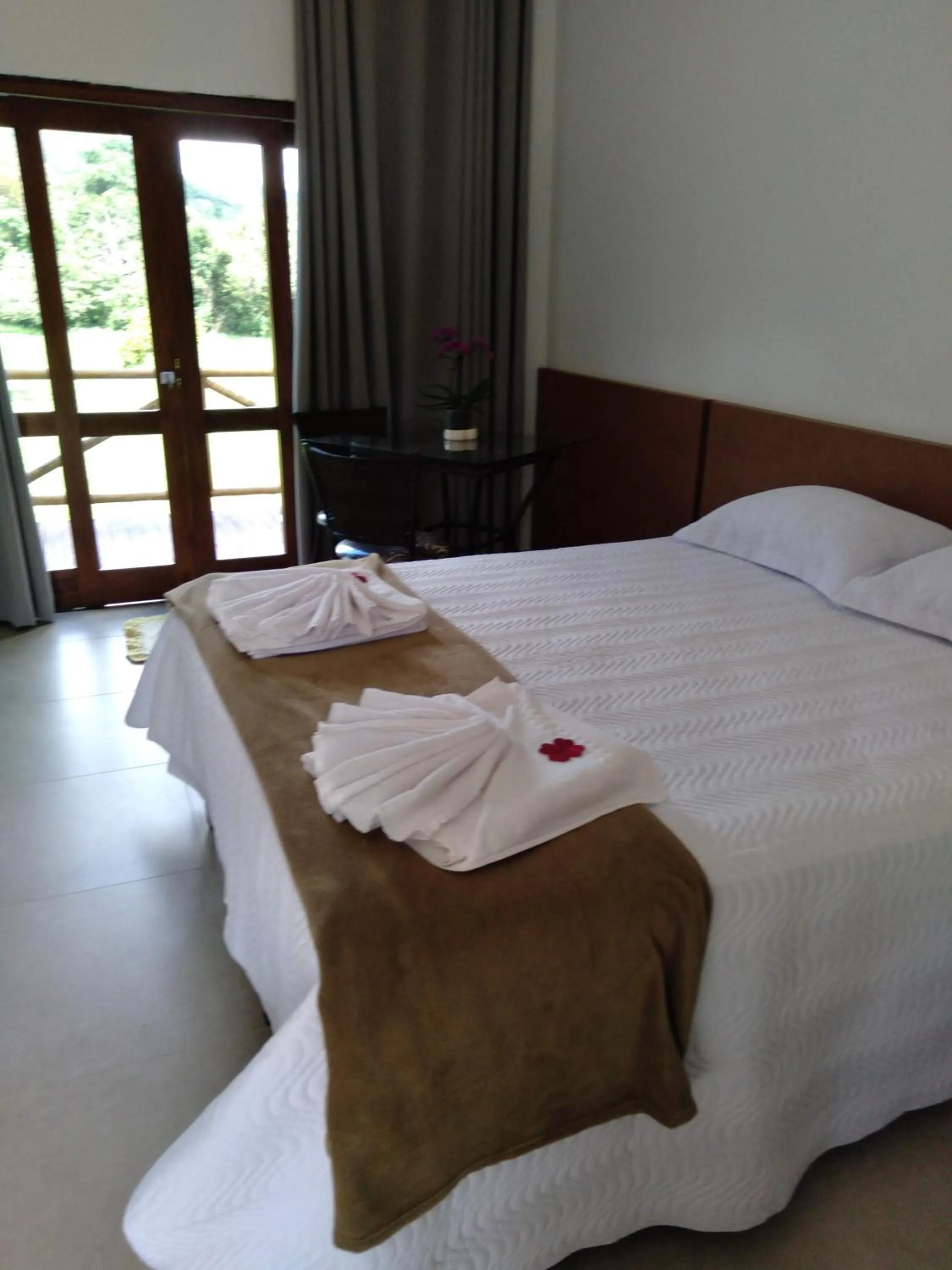 Bed in Chalé Águas Claras
