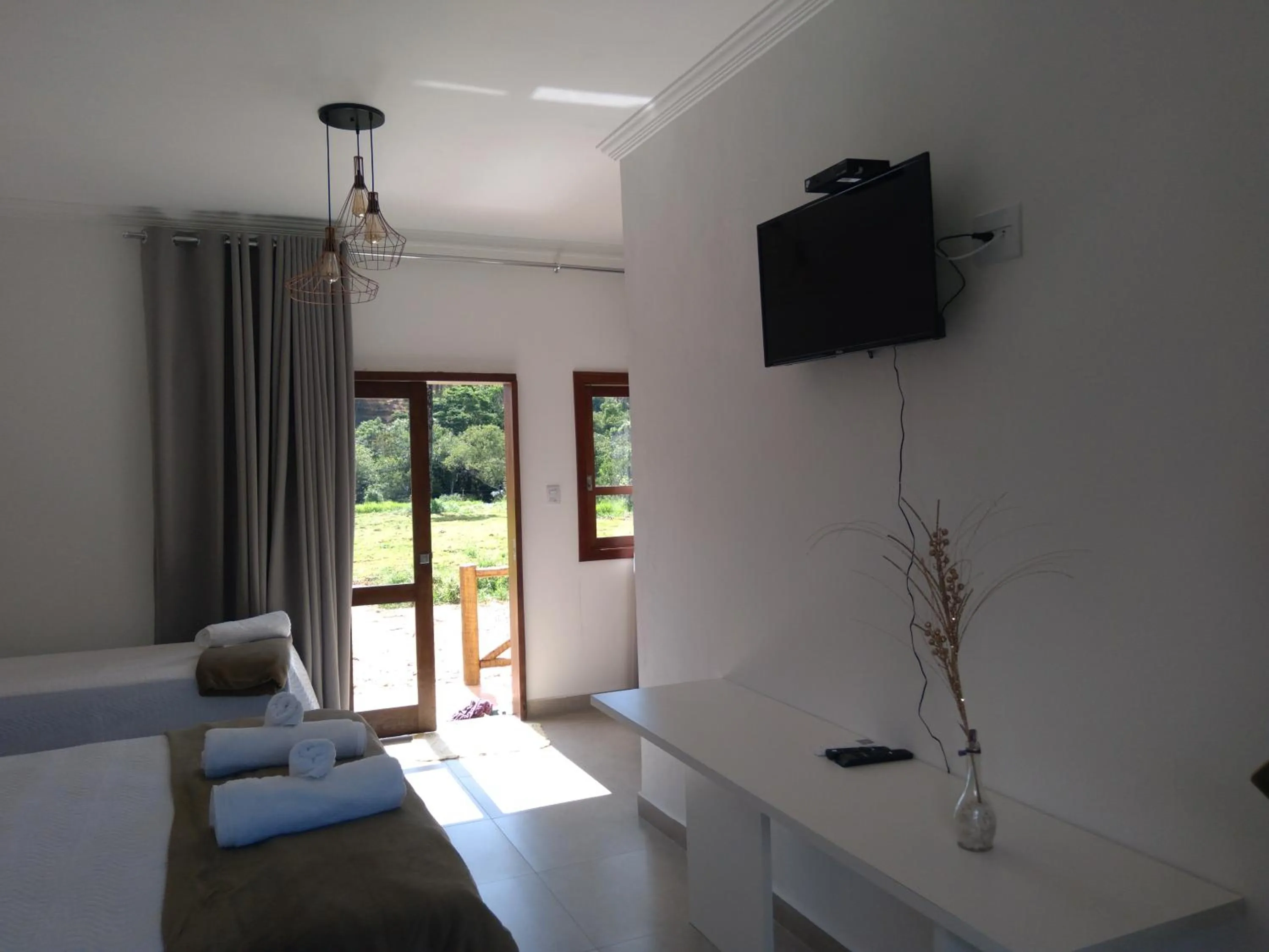 Communal lounge/ TV room in Chalé Águas Claras