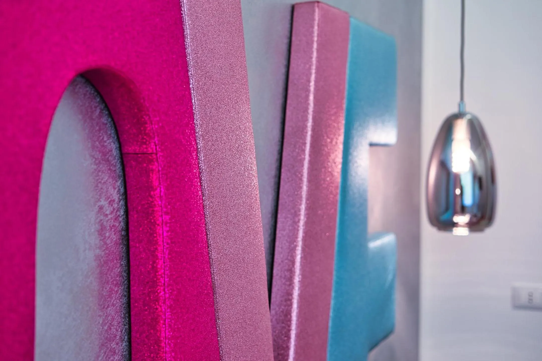 Bed in DISTINTO SUITE & ROOMS