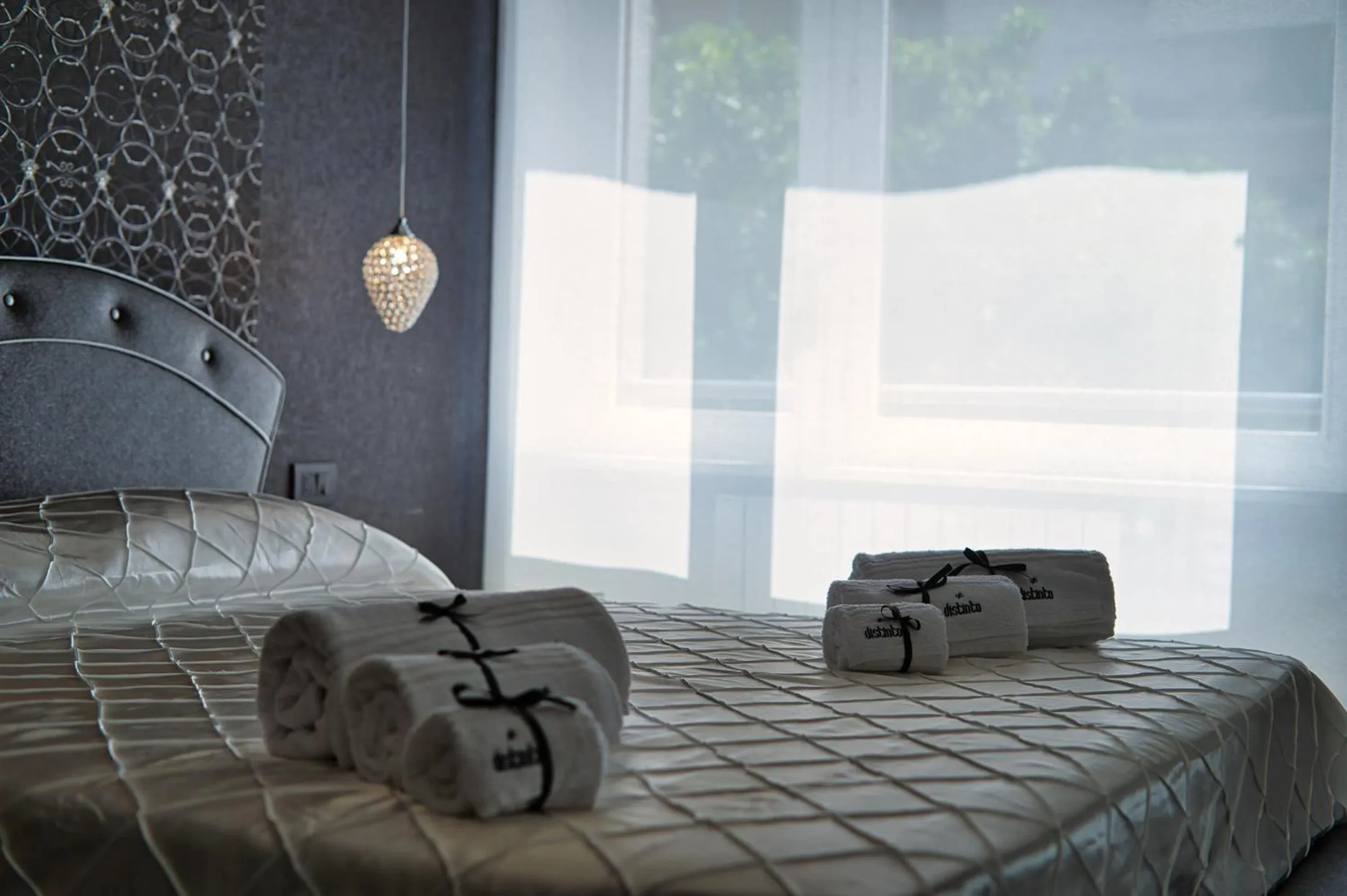 Bedroom, Bed in DISTINTO SUITE & ROOMS