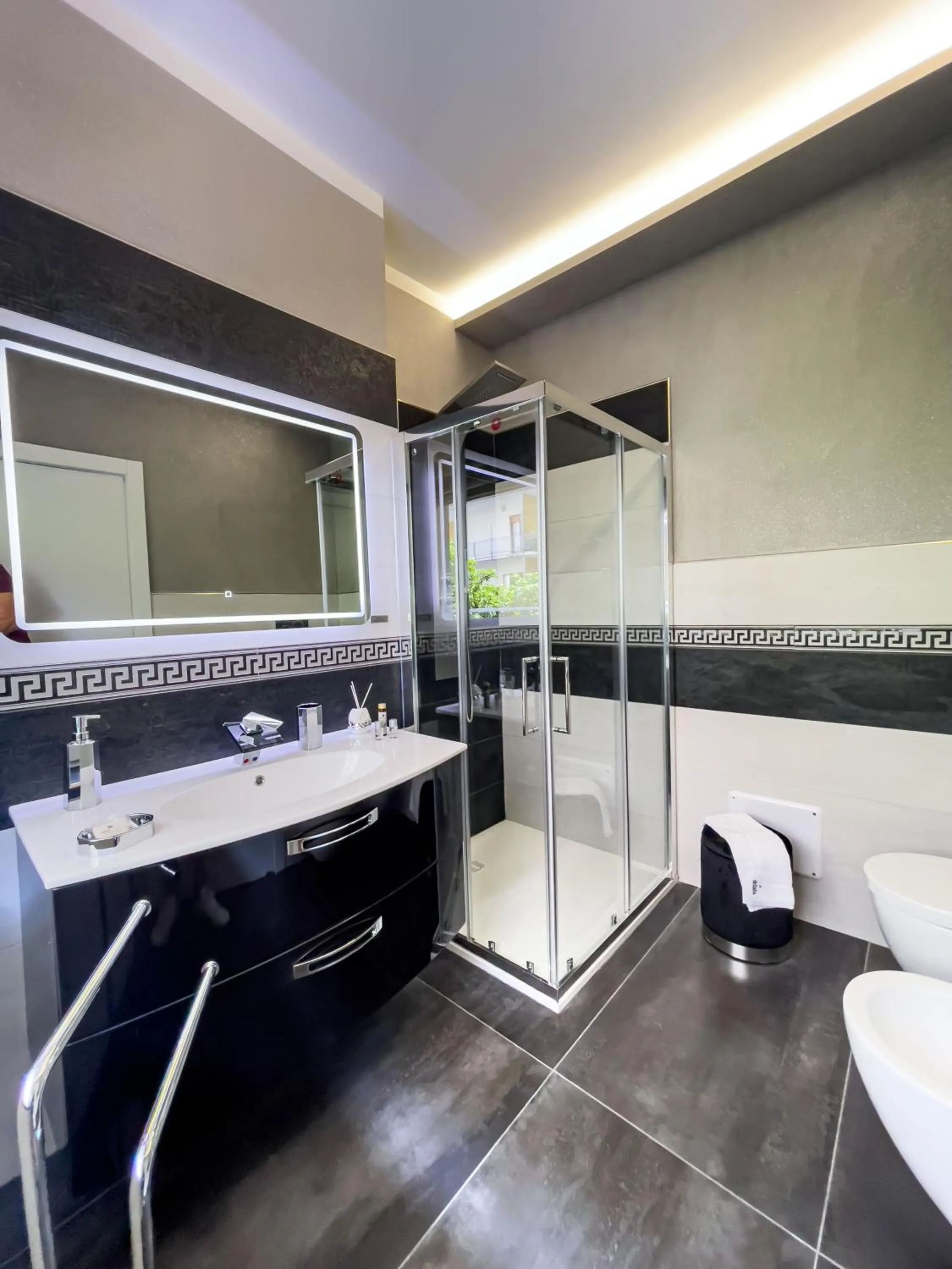 Bathroom in DISTINTO SUITE & ROOMS