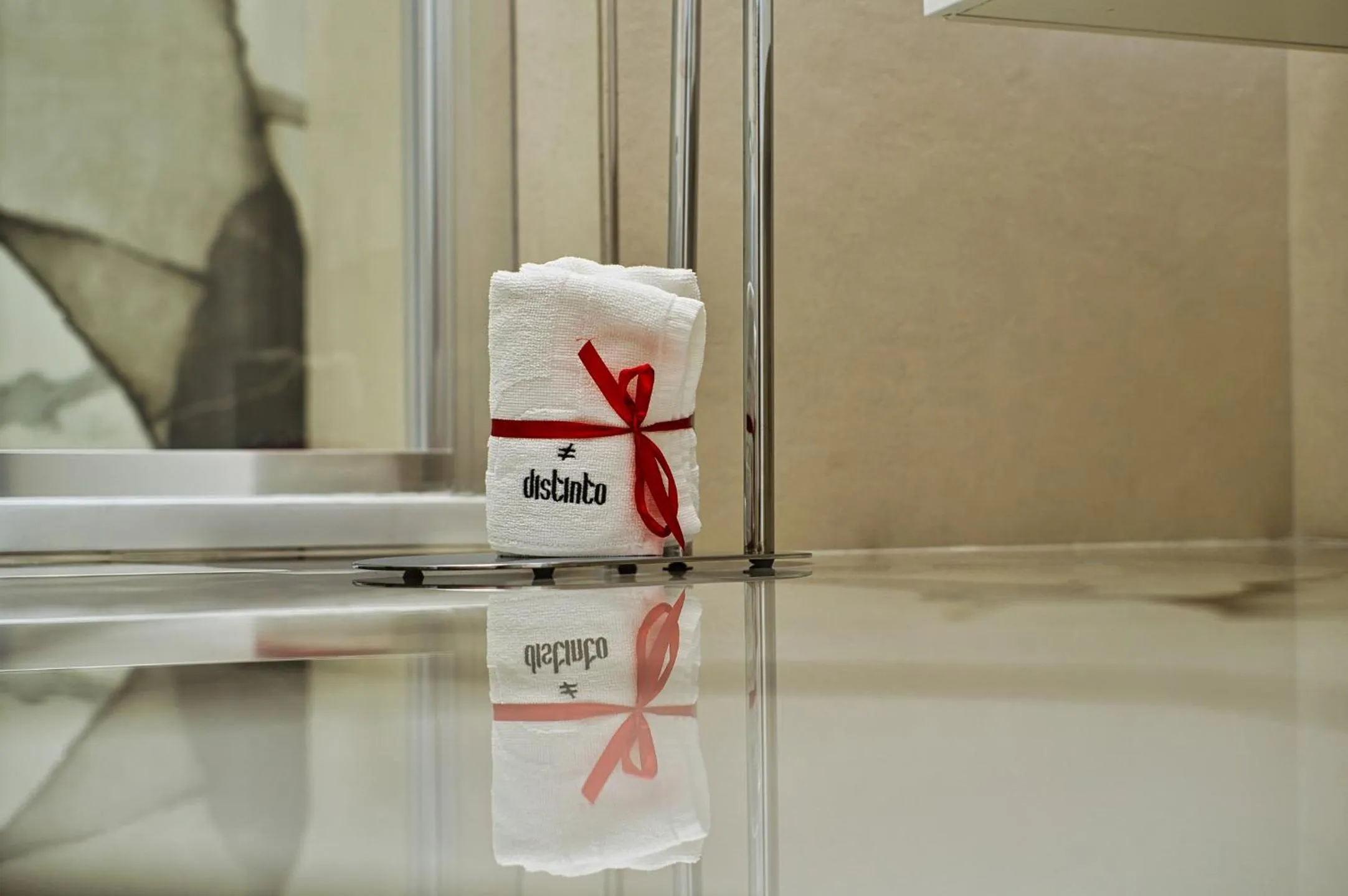 Property logo or sign in DISTINTO SUITE & ROOMS