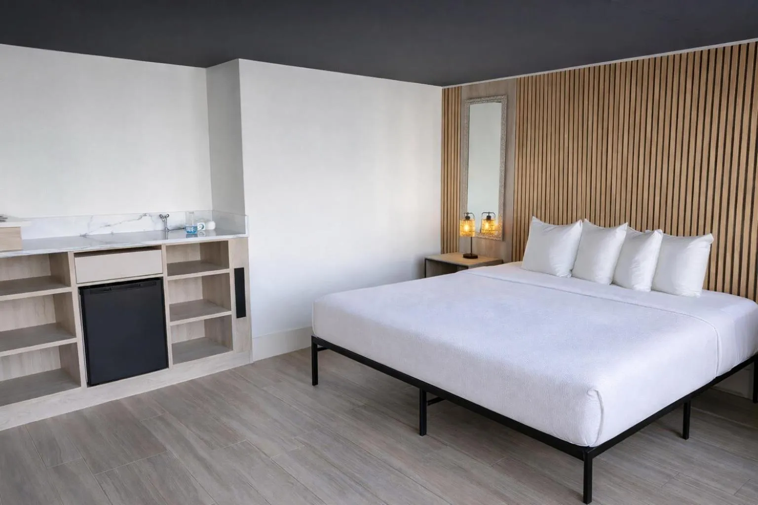 Bed in Tropical Palms Hotel