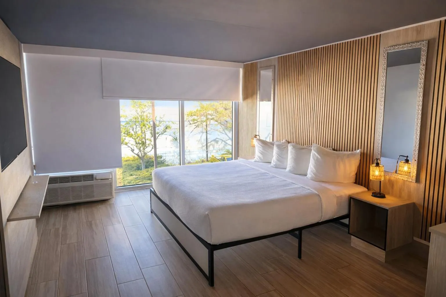 Bed in Tropical Palms Hotel