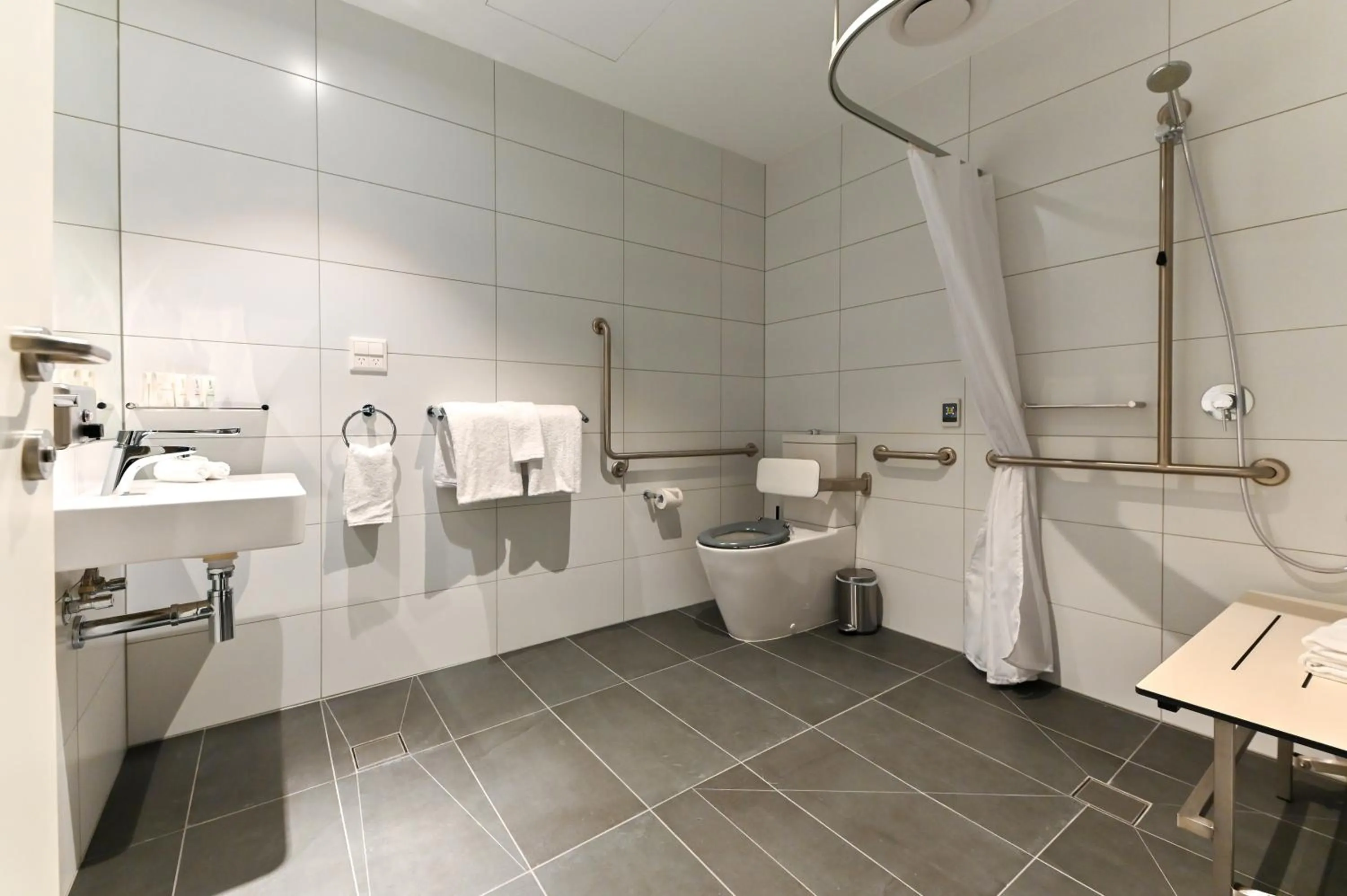 Shower in Nesuto Curtin Perth Hotel