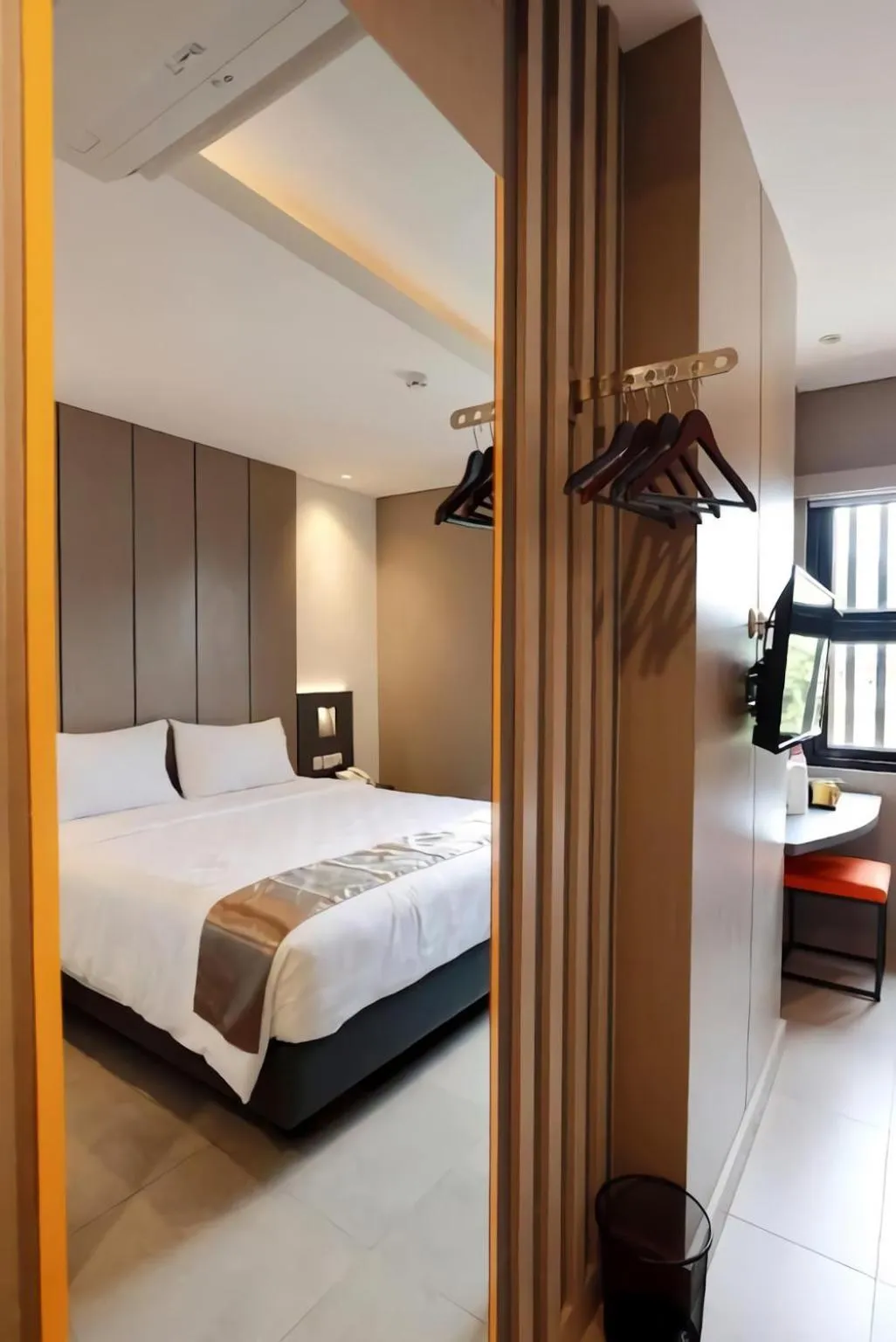 Property building, Bed in Hayo Hotel Palembang