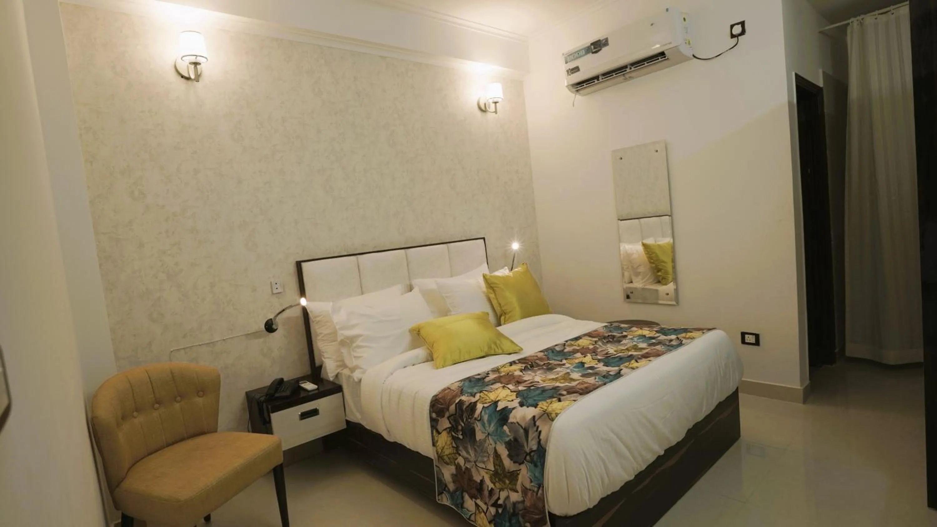 Bed in MK Hotel and Restaurant