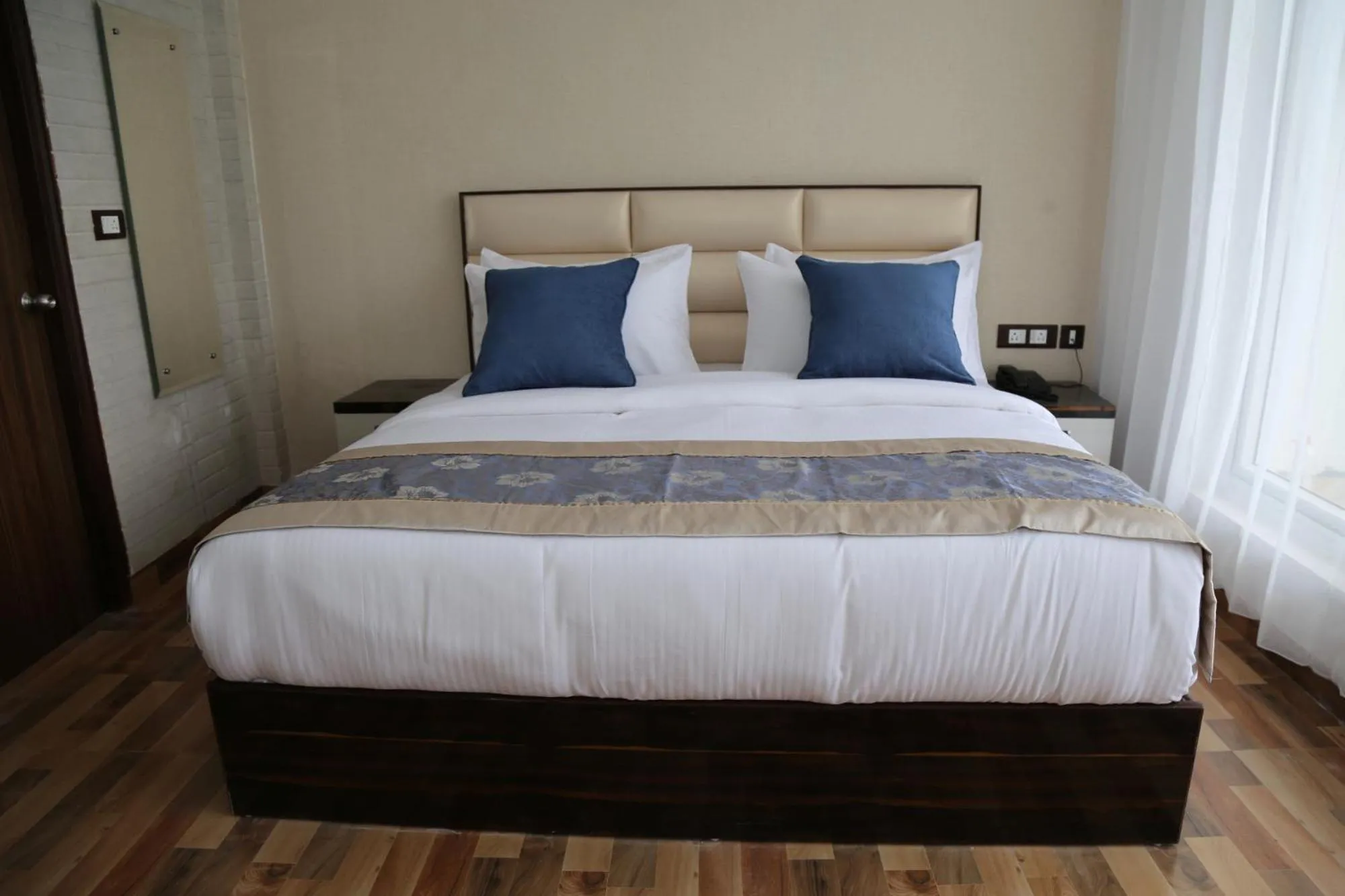 Bed in MK Hotel and Restaurant