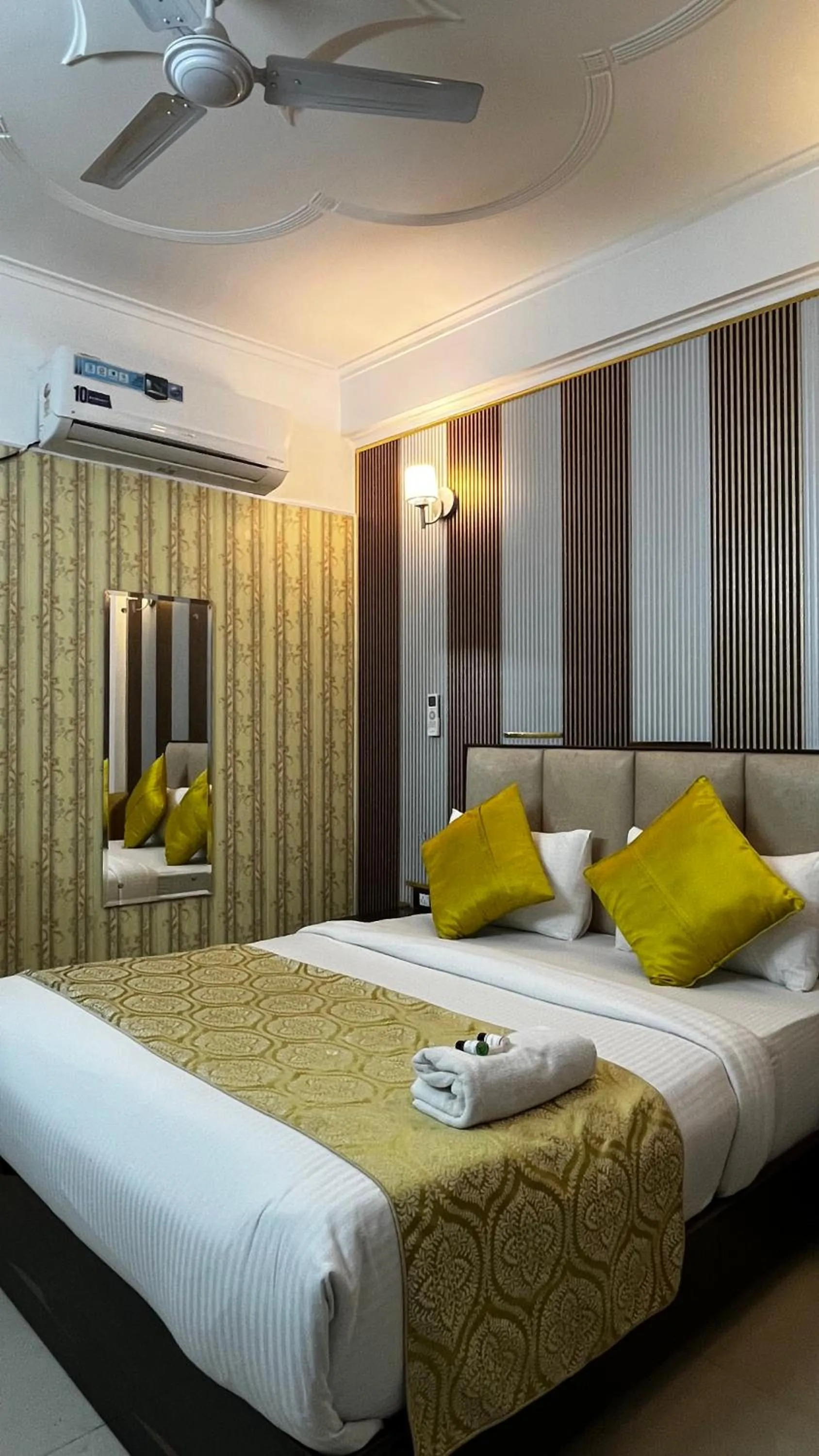 Bed in MK Hotel and Restaurant