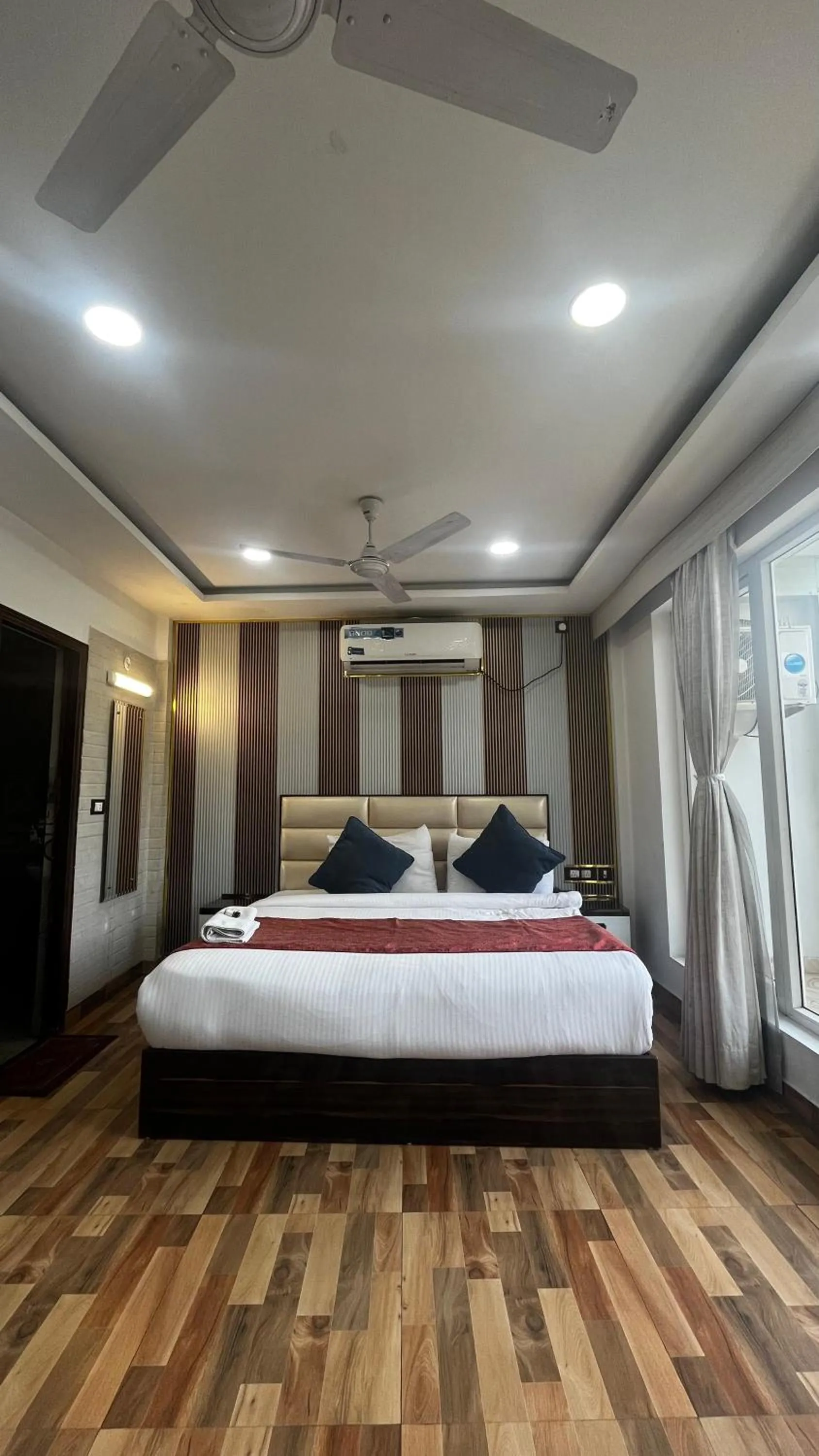 Bed in MK Hotel and Restaurant