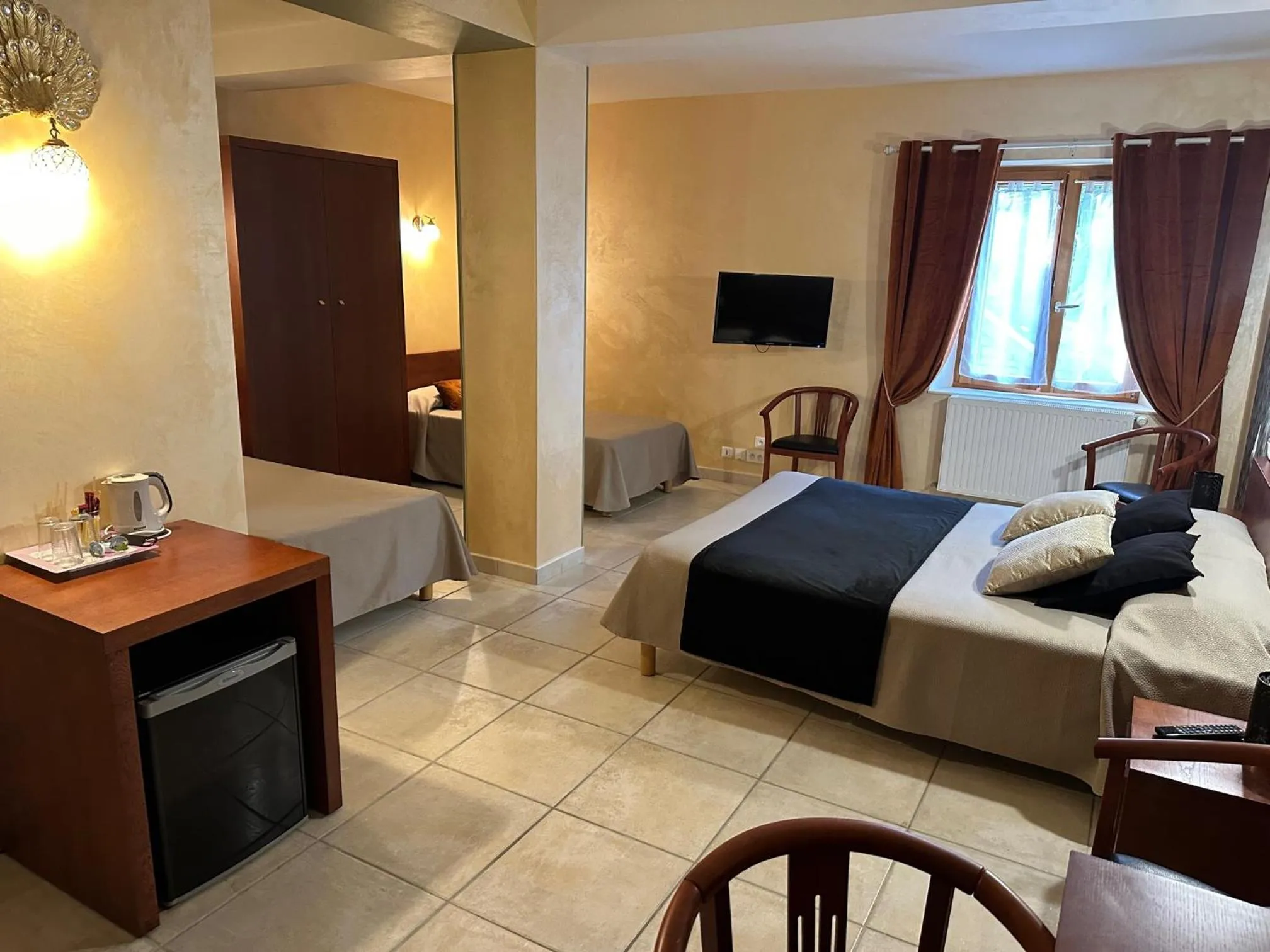 Bed in Hôtel Bon Encontre