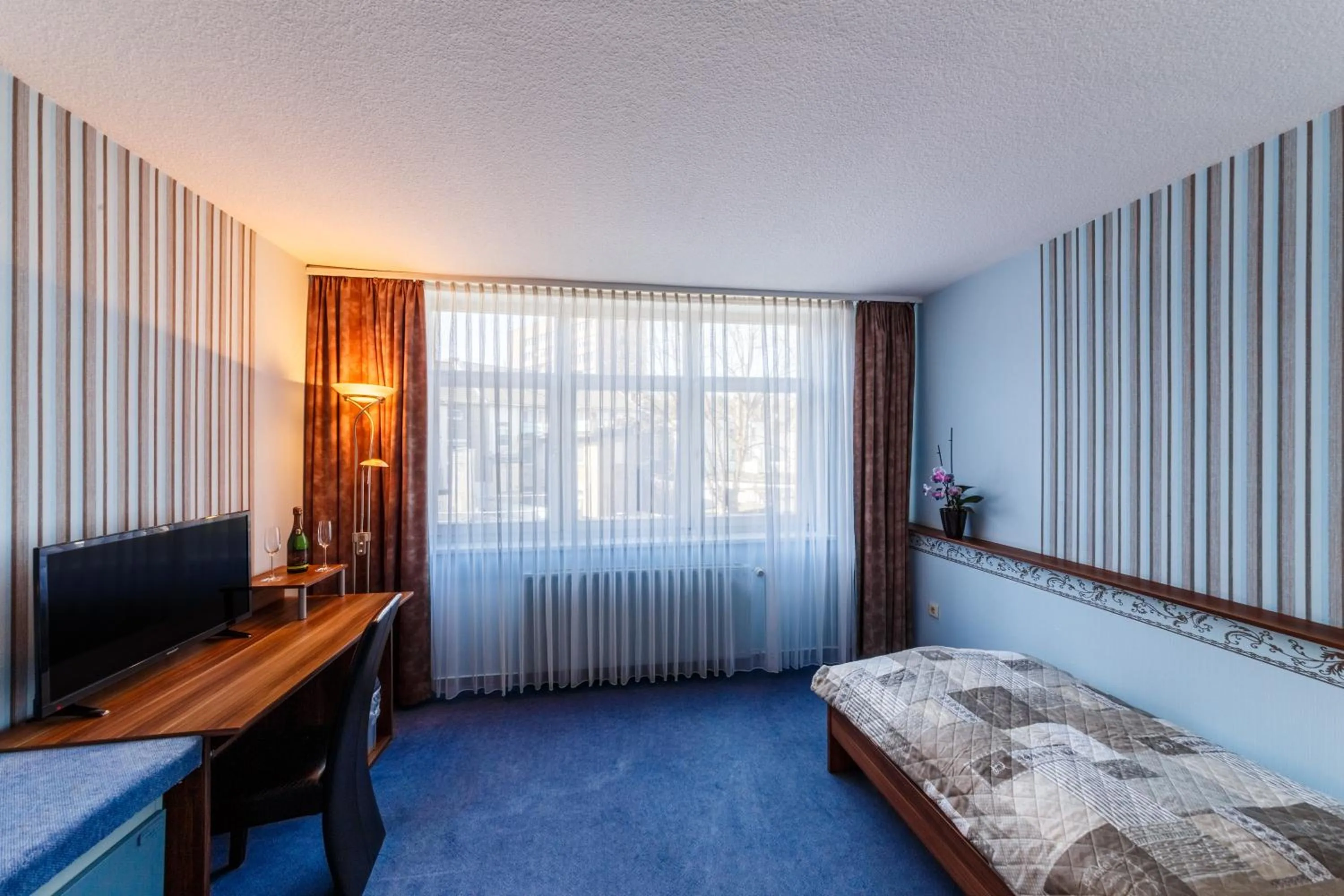 Bed in City Hotel Stolberg