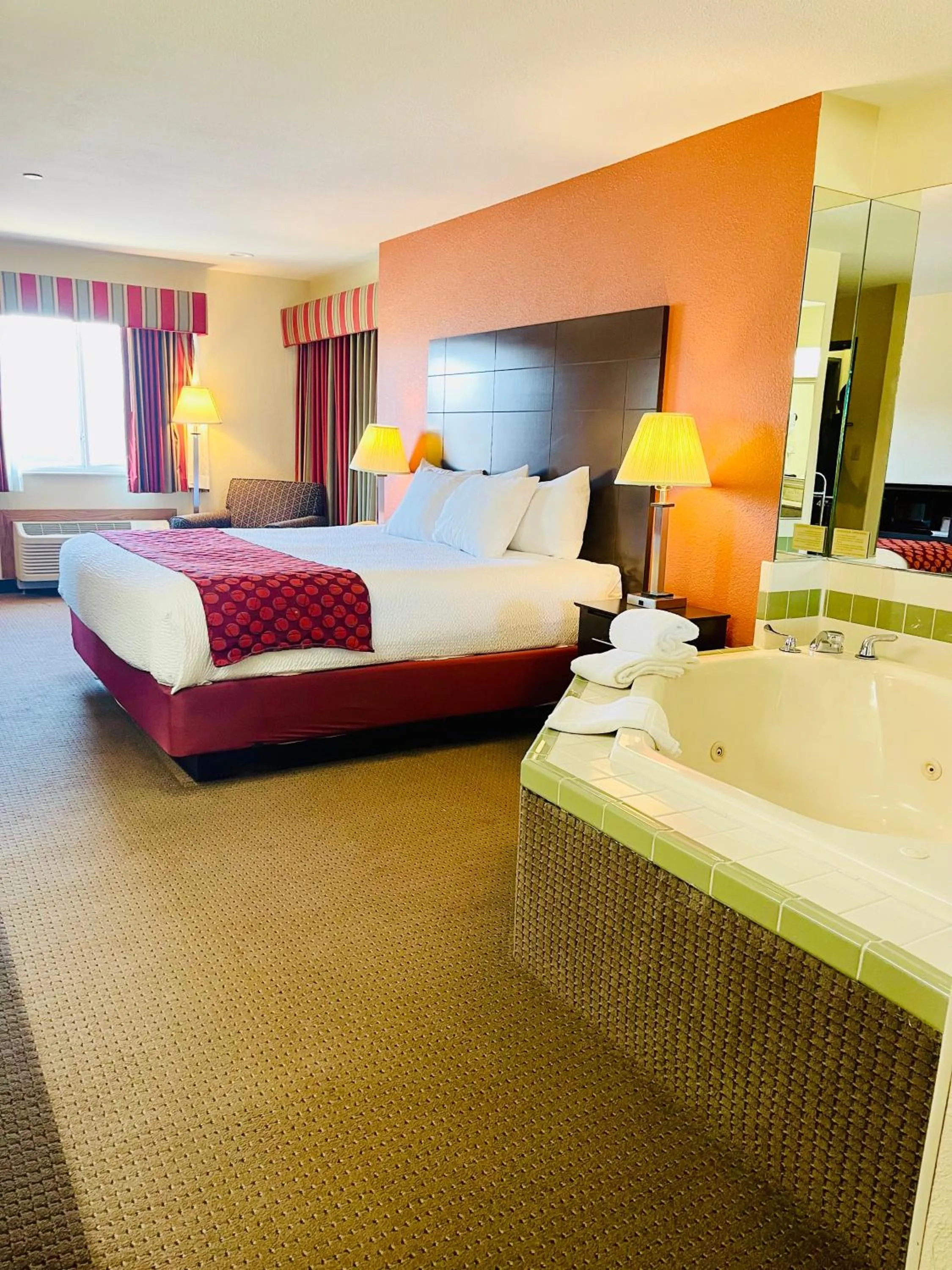 Hot Tub, Bed in Baymont by Wyndham Indianapolis