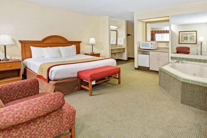 Bed in Baymont by Wyndham Indianapolis