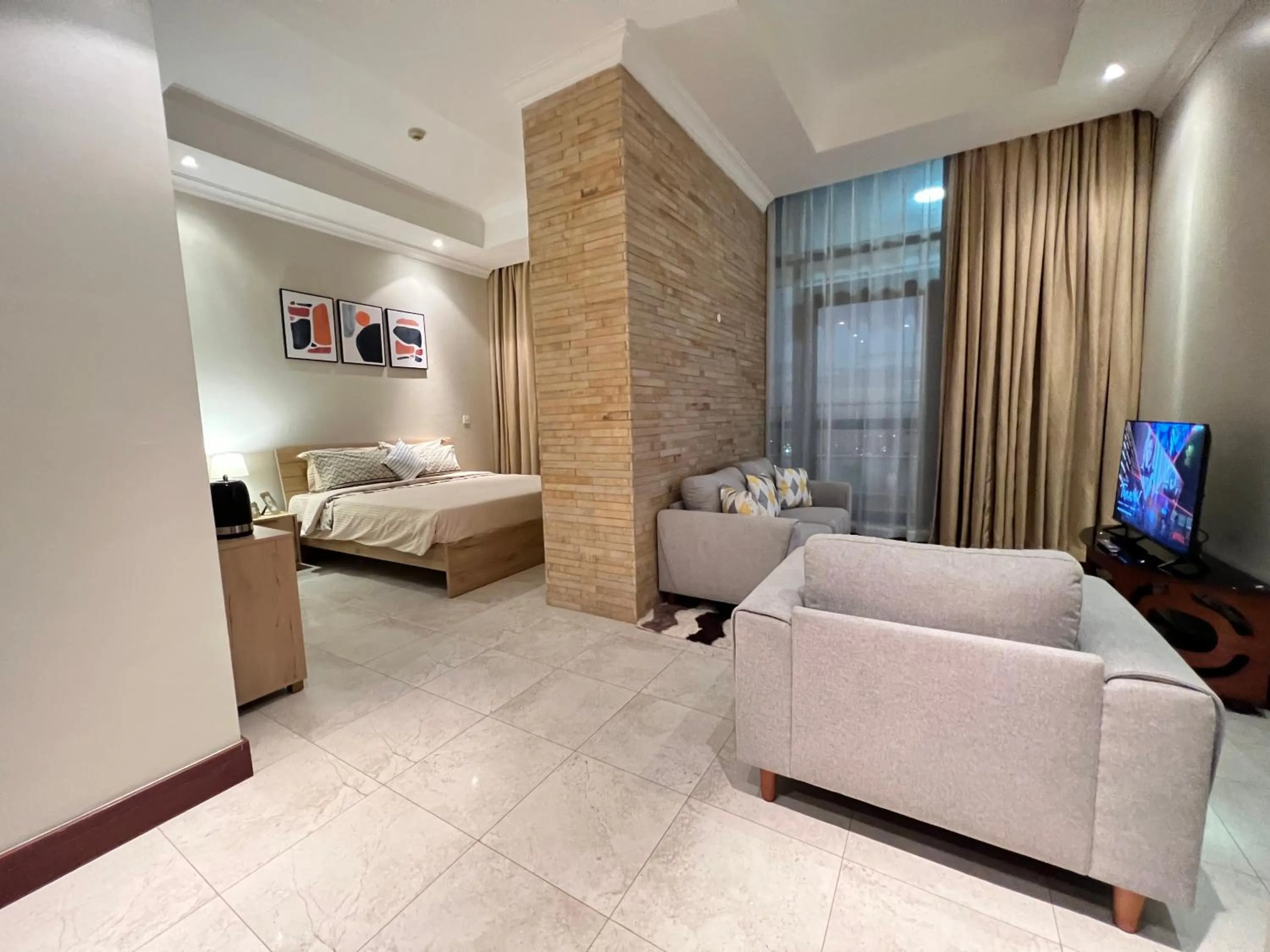 Living room, Bed in Fairview Luxury Apartments