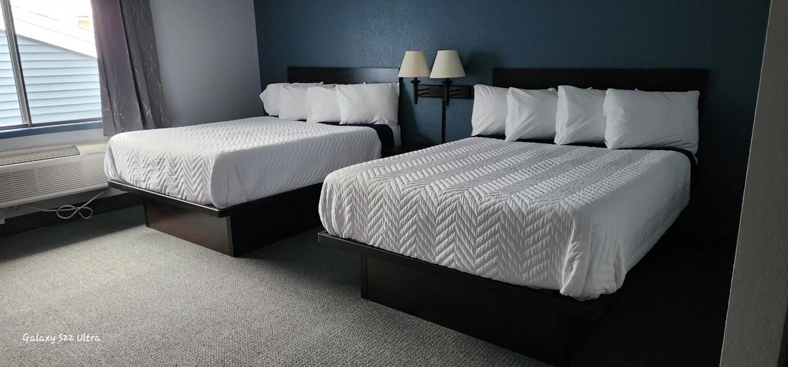 Bed in The Oasis Hotel & Bar