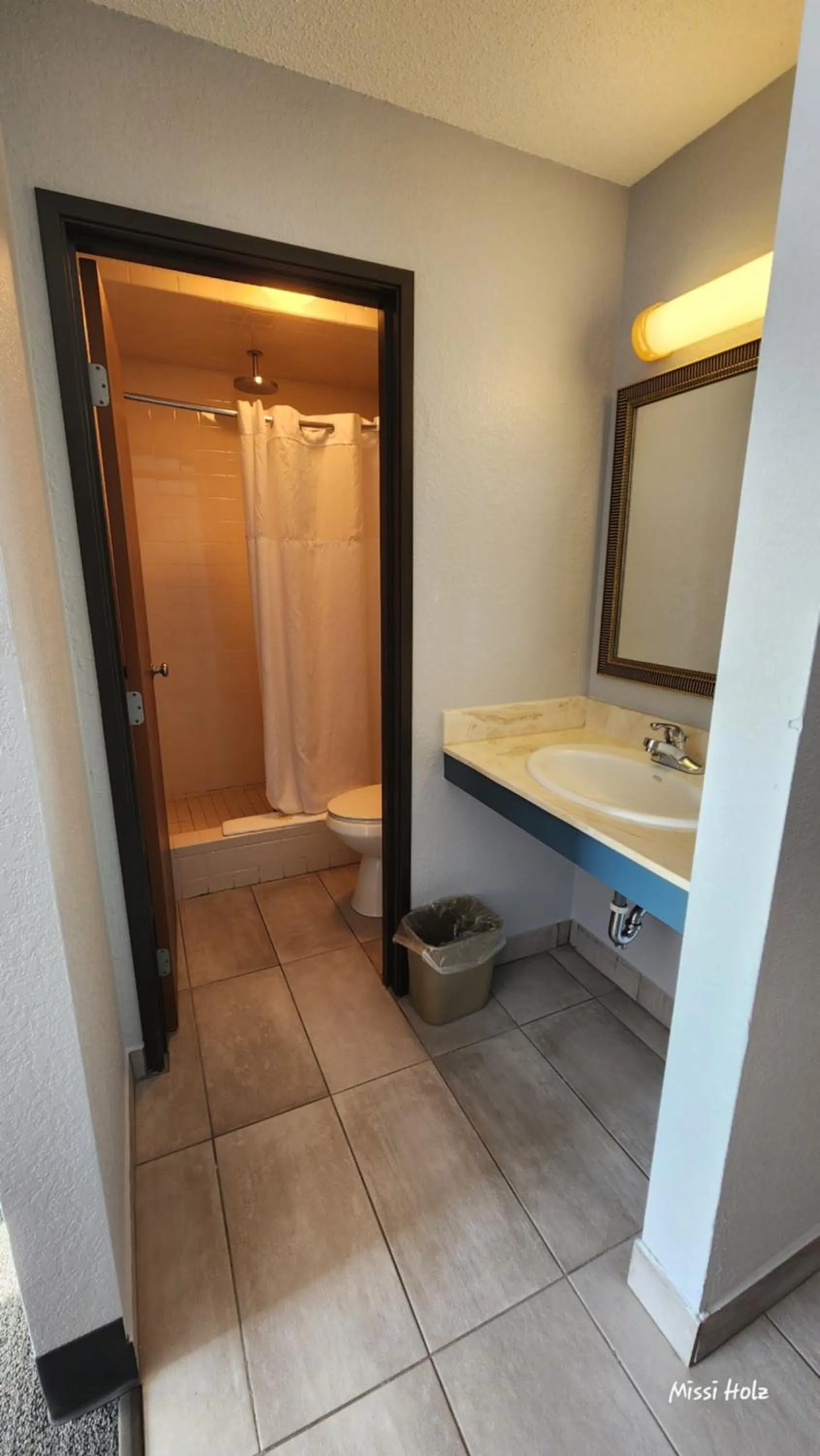 Bathroom in The Oasis Hotel & Bar