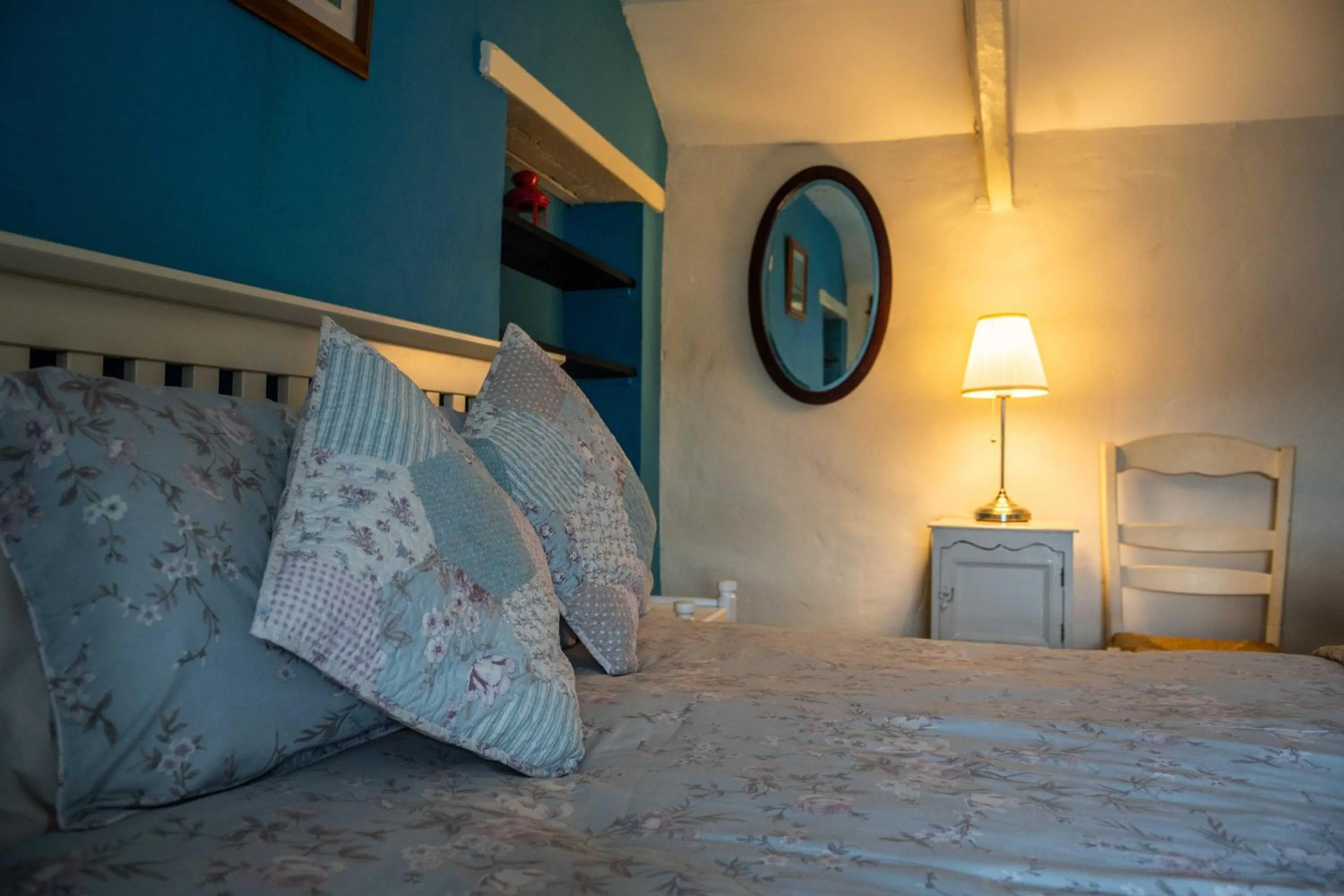 Bed in Manorbier Castle Inn Bay Room