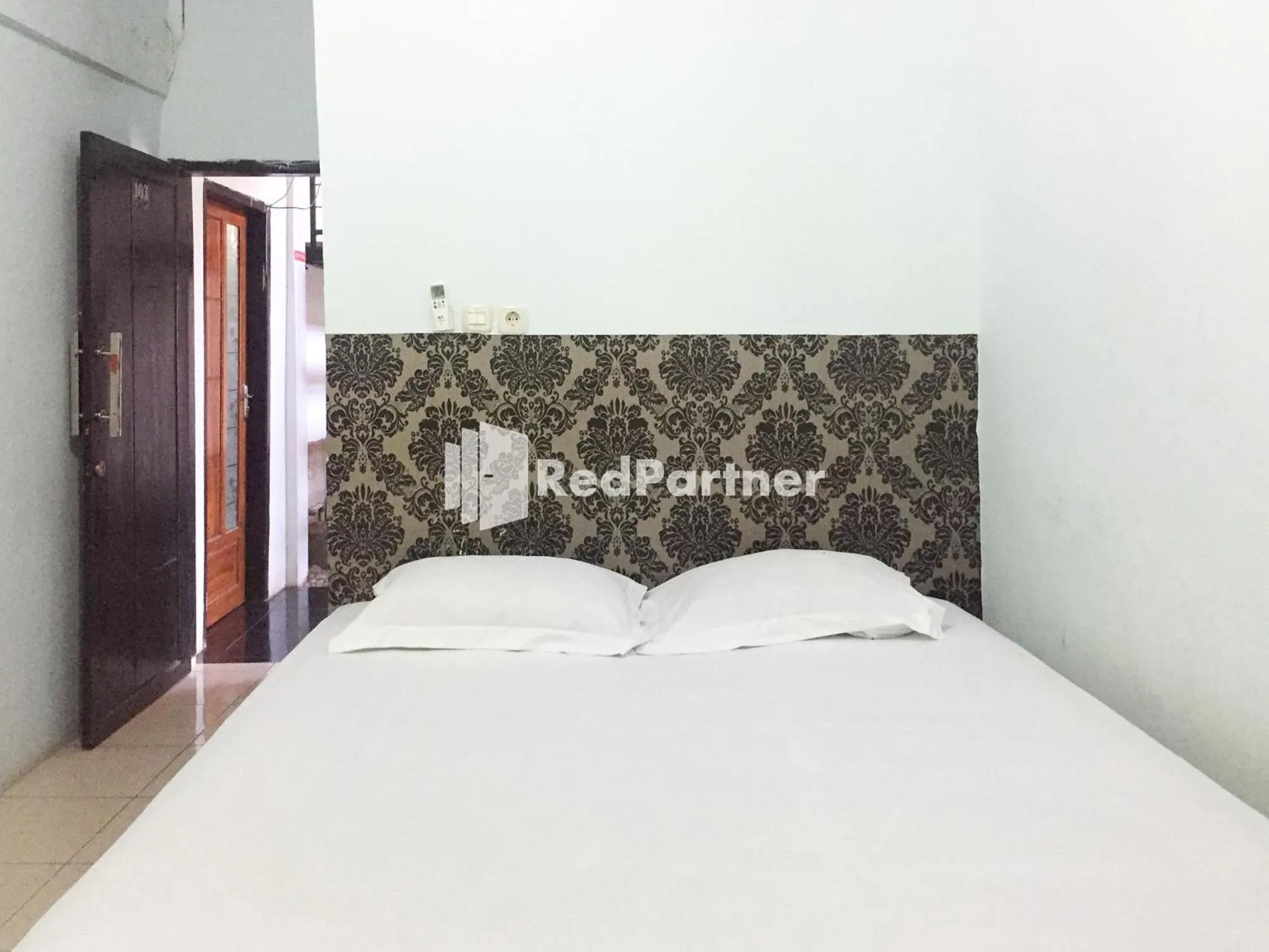 Bed in Wisma Andini Palopo RedPartner
