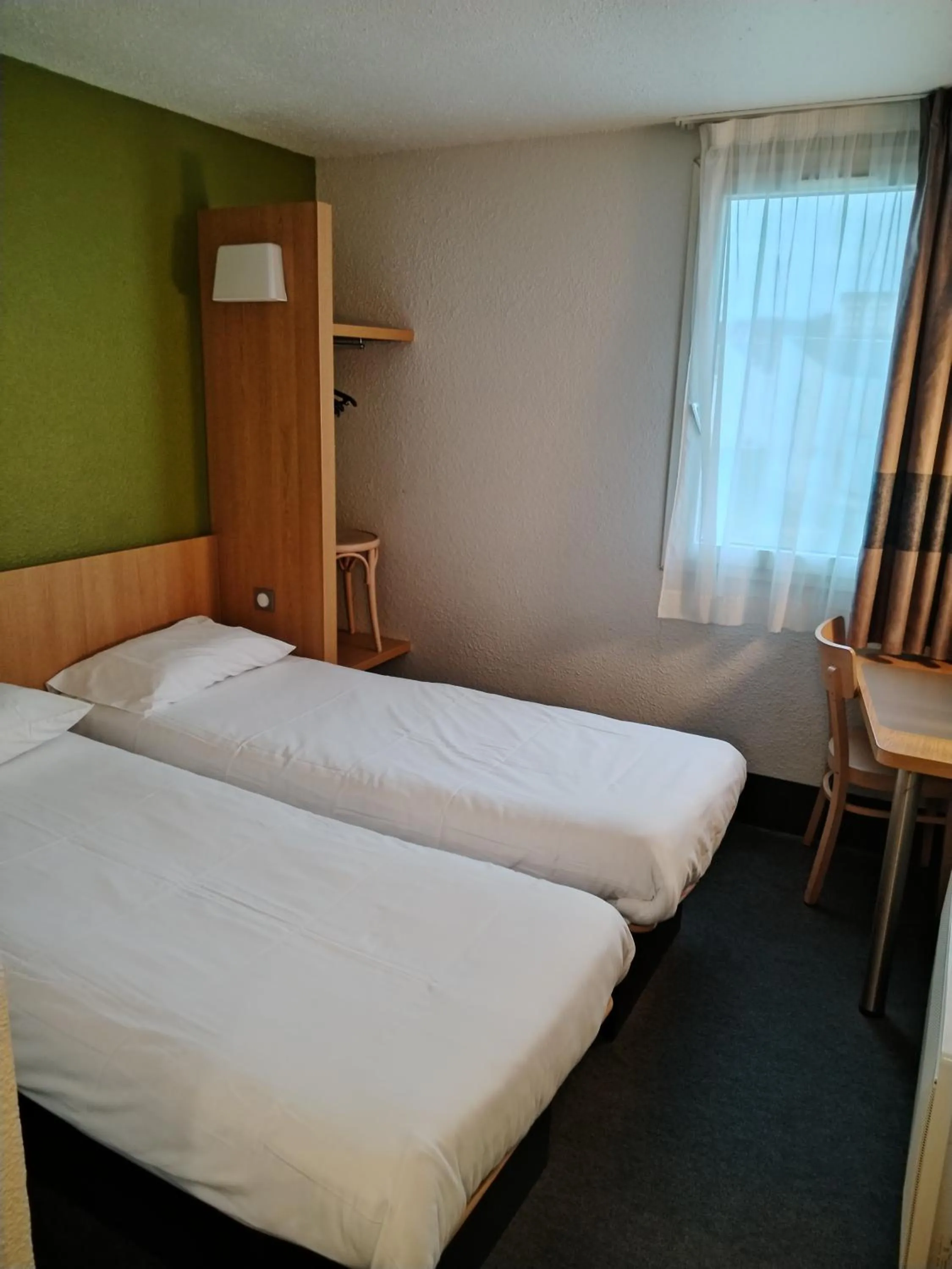 Photo of the whole room, Bed in Hotel Inn Design Montluçon