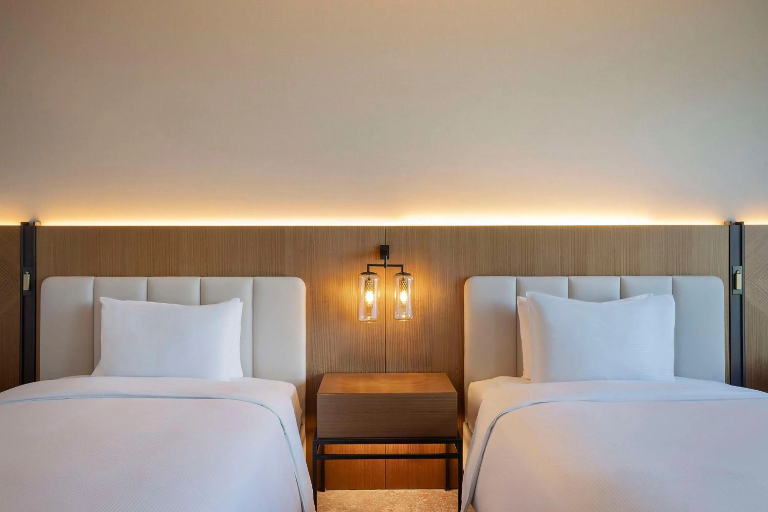 Bed in DoubleTree by Hilton Sharjah Waterfront Hotel And Residences