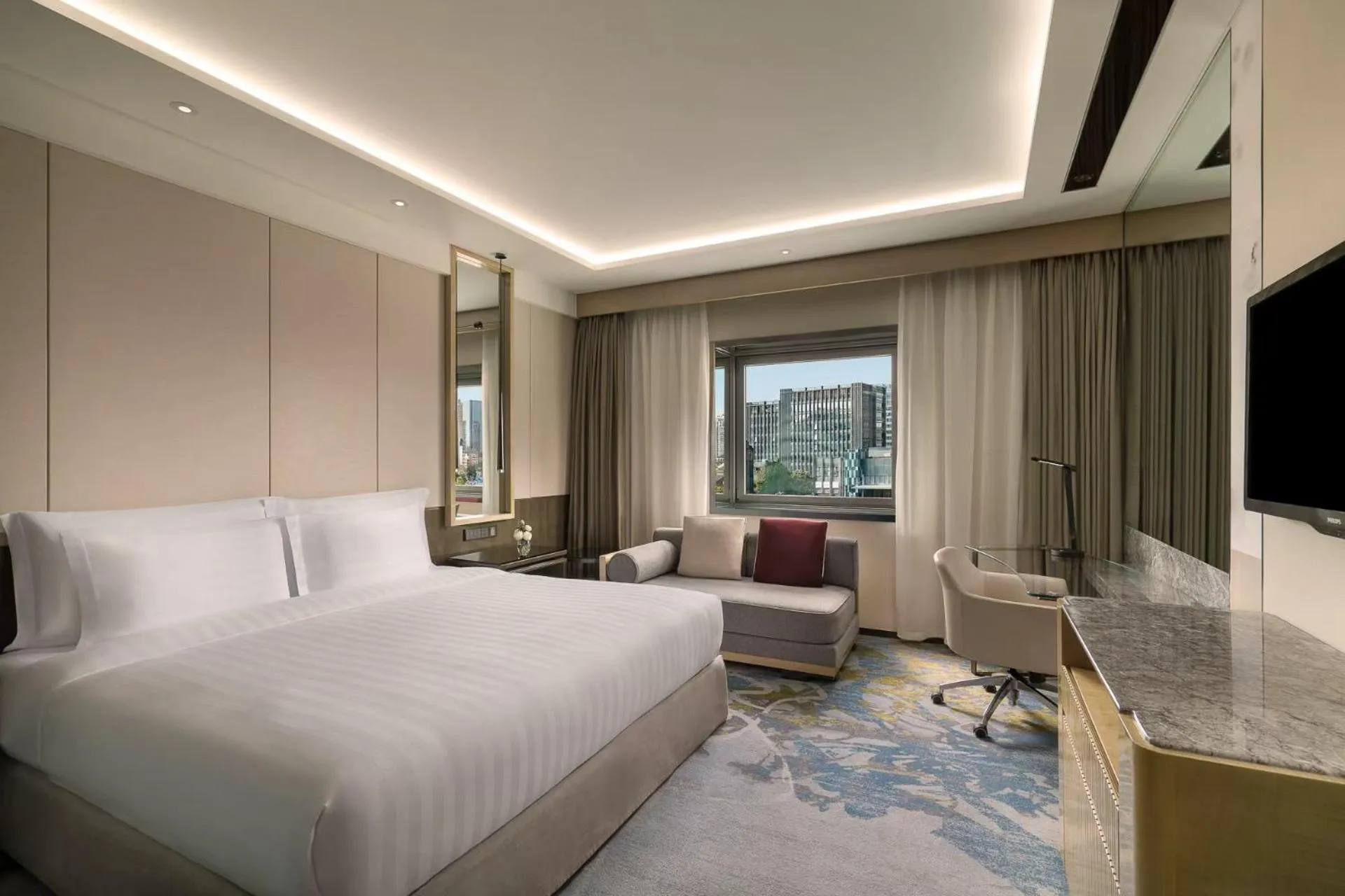Bed in Kempinski Hotel Beijing Yansha Center