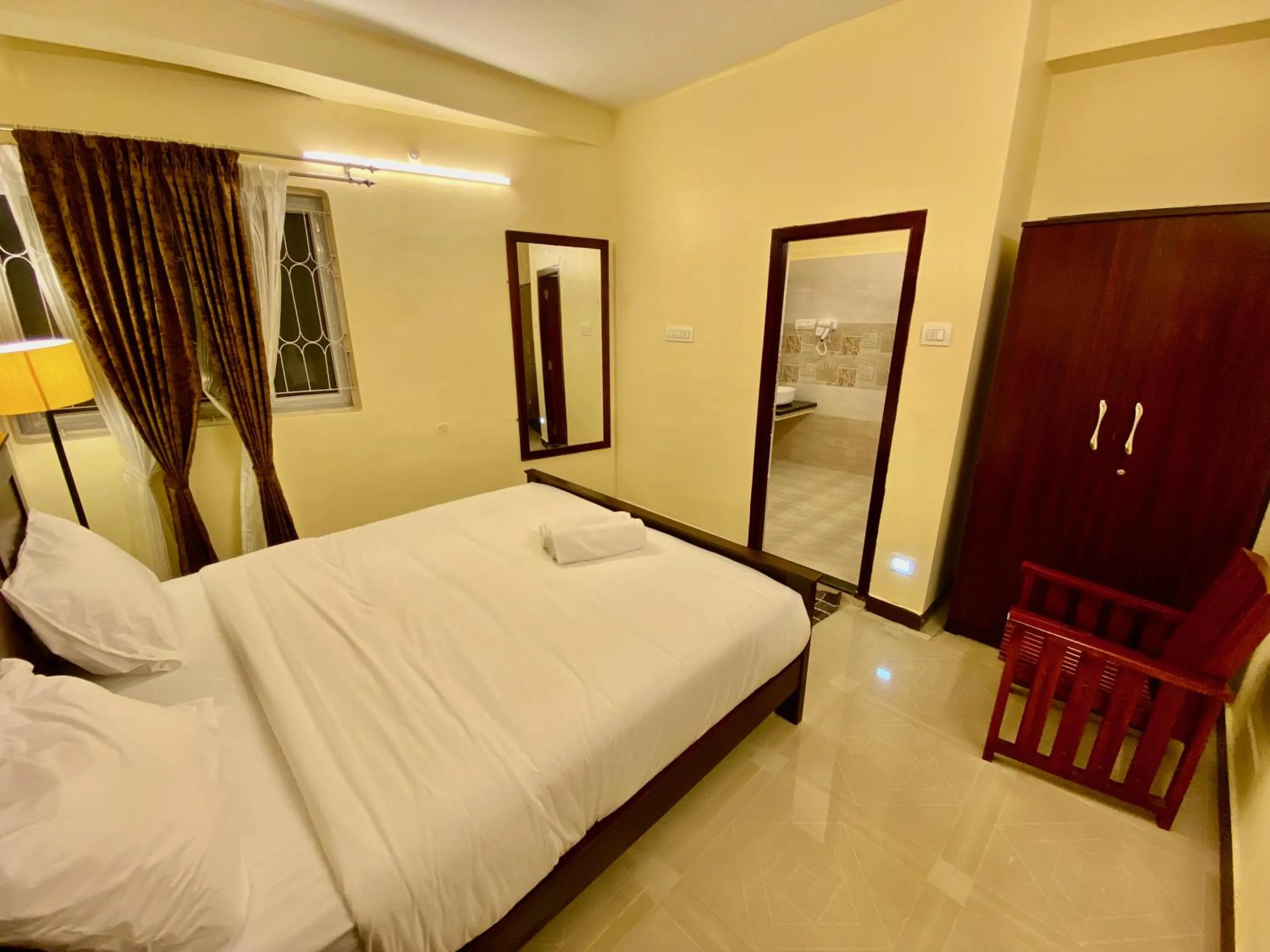 Photo of the whole room, Bed in Aakash Rooms and Cottages,