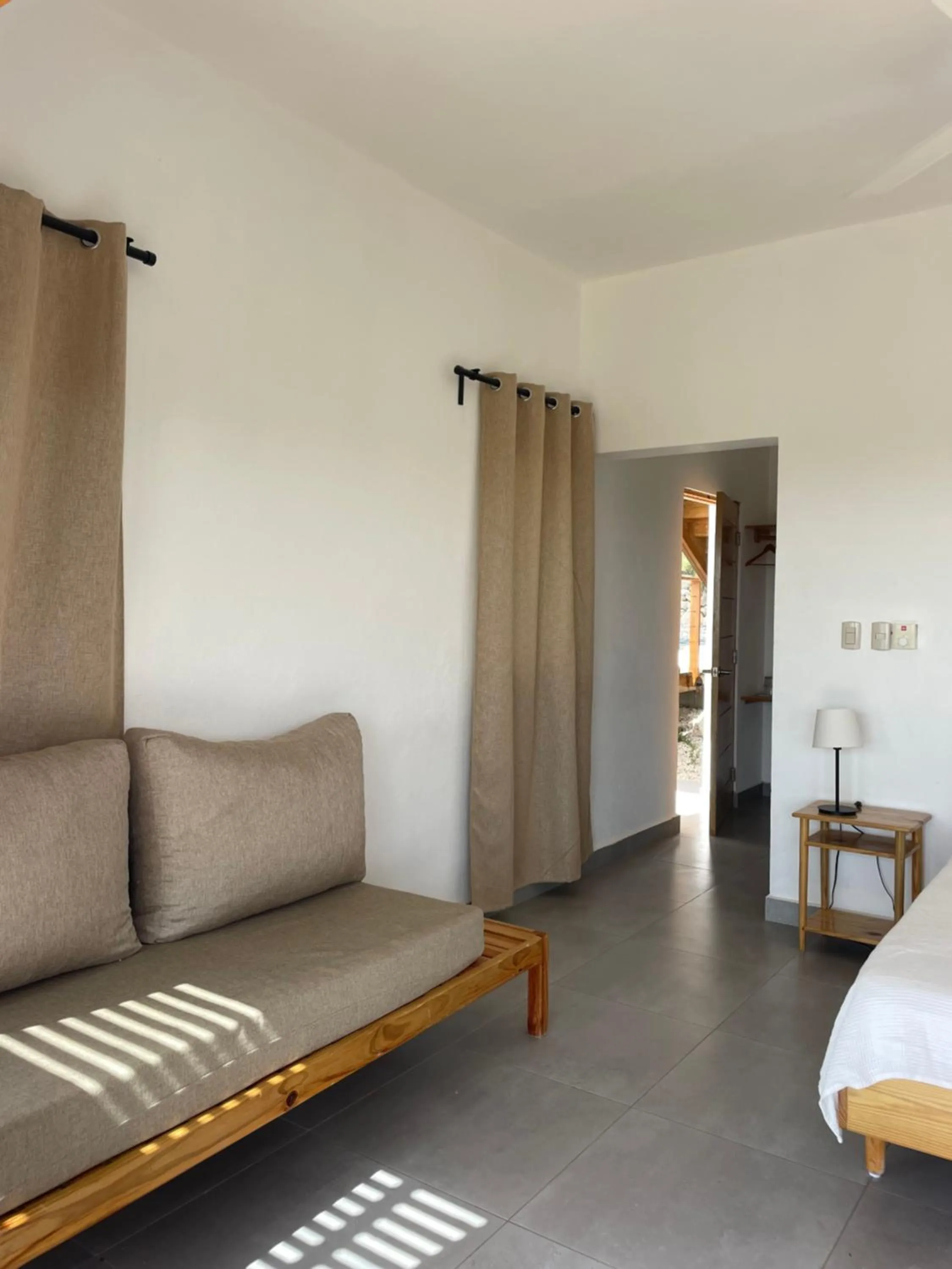 Seating area, Bed in Altos de la Caobita