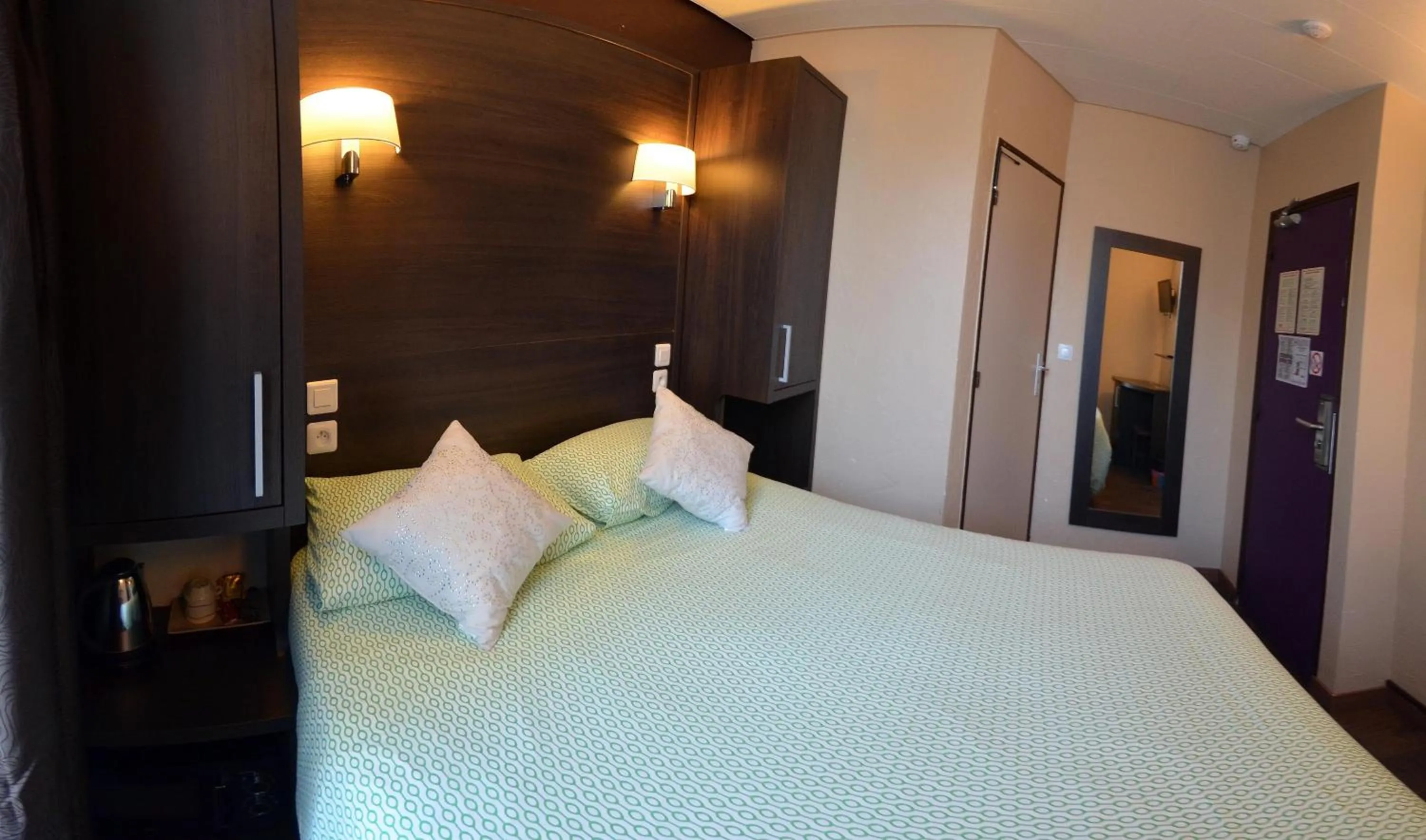 Bed in Hôtel du Parc