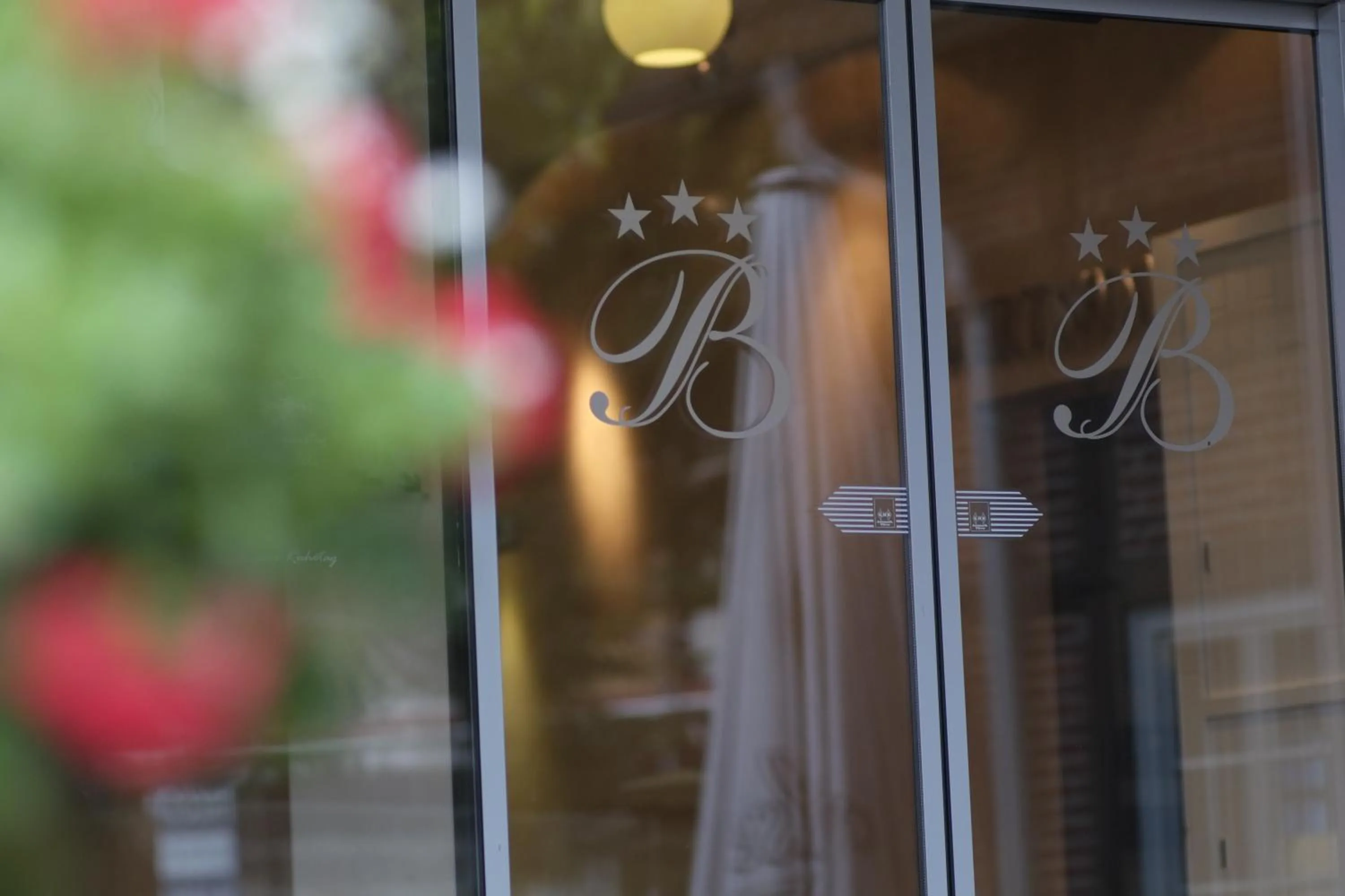 Property logo or sign in Hotel Brunnenhof International