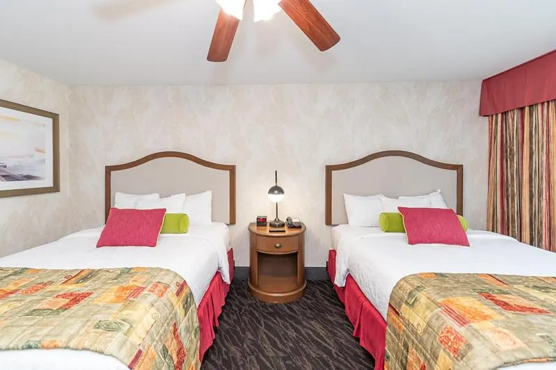 Bed in Bellissimo Hotel, Trademark by Wyndham Near Foxwoods Casino