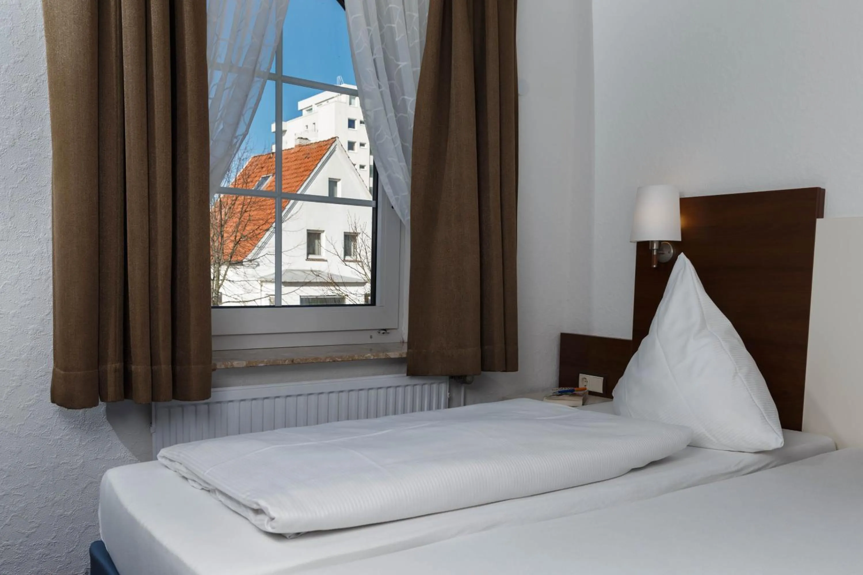 Photo of the whole room, Bed in Hotel Seeschwalbe