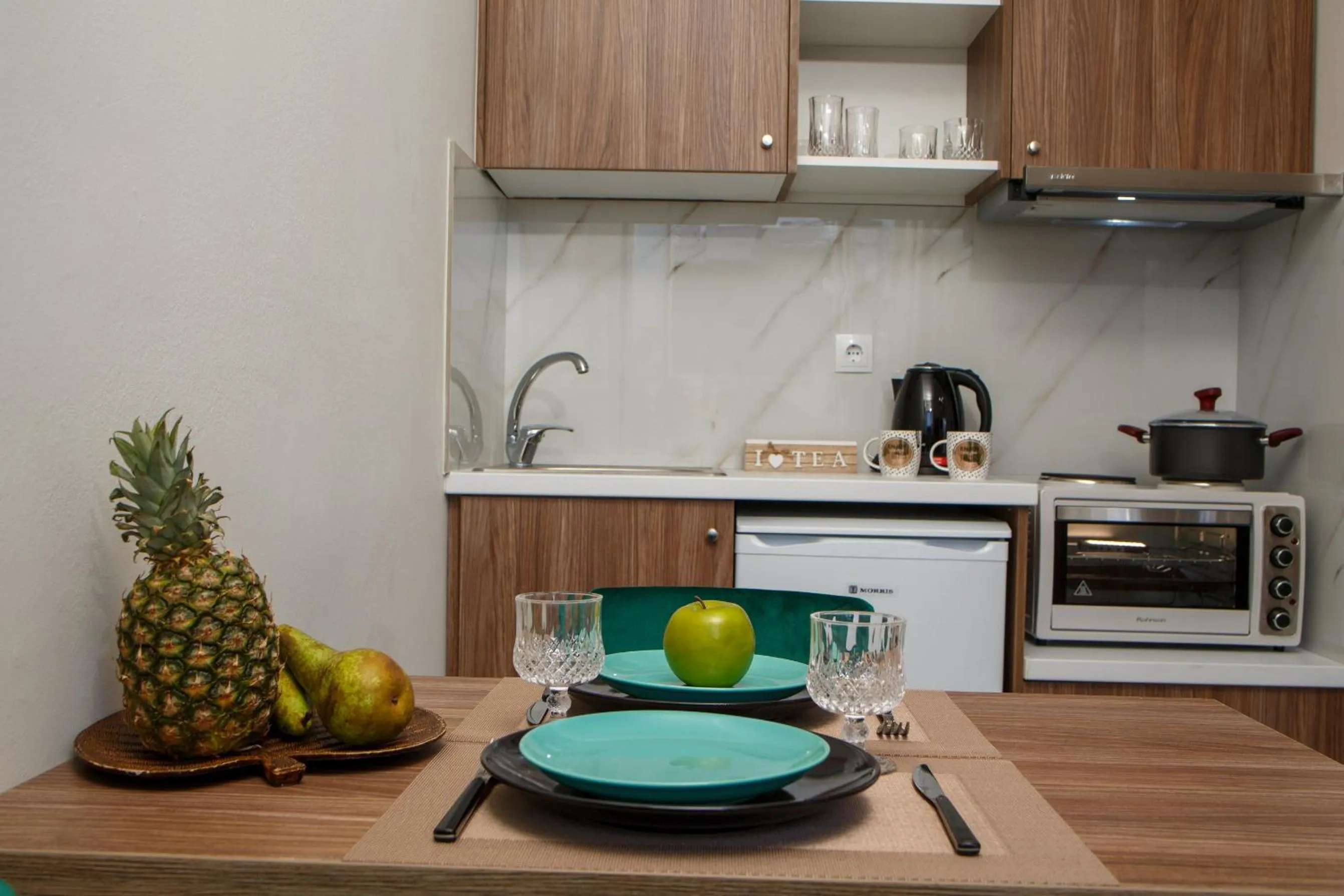 Kitchen or kitchenette in Asterion Luxury Studios Airport