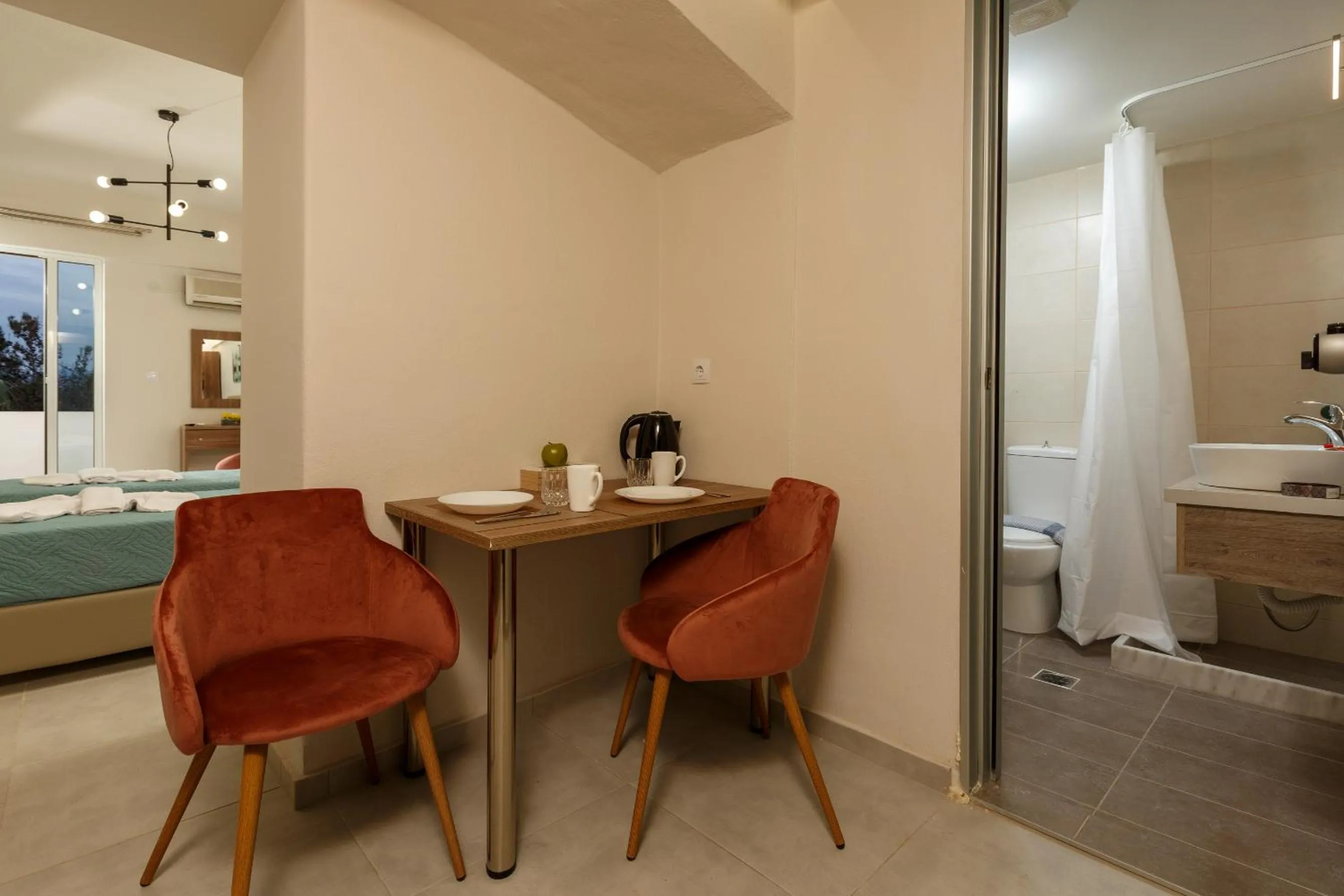 Coffee/tea facilities, Bed in Asterion Luxury Studios Airport