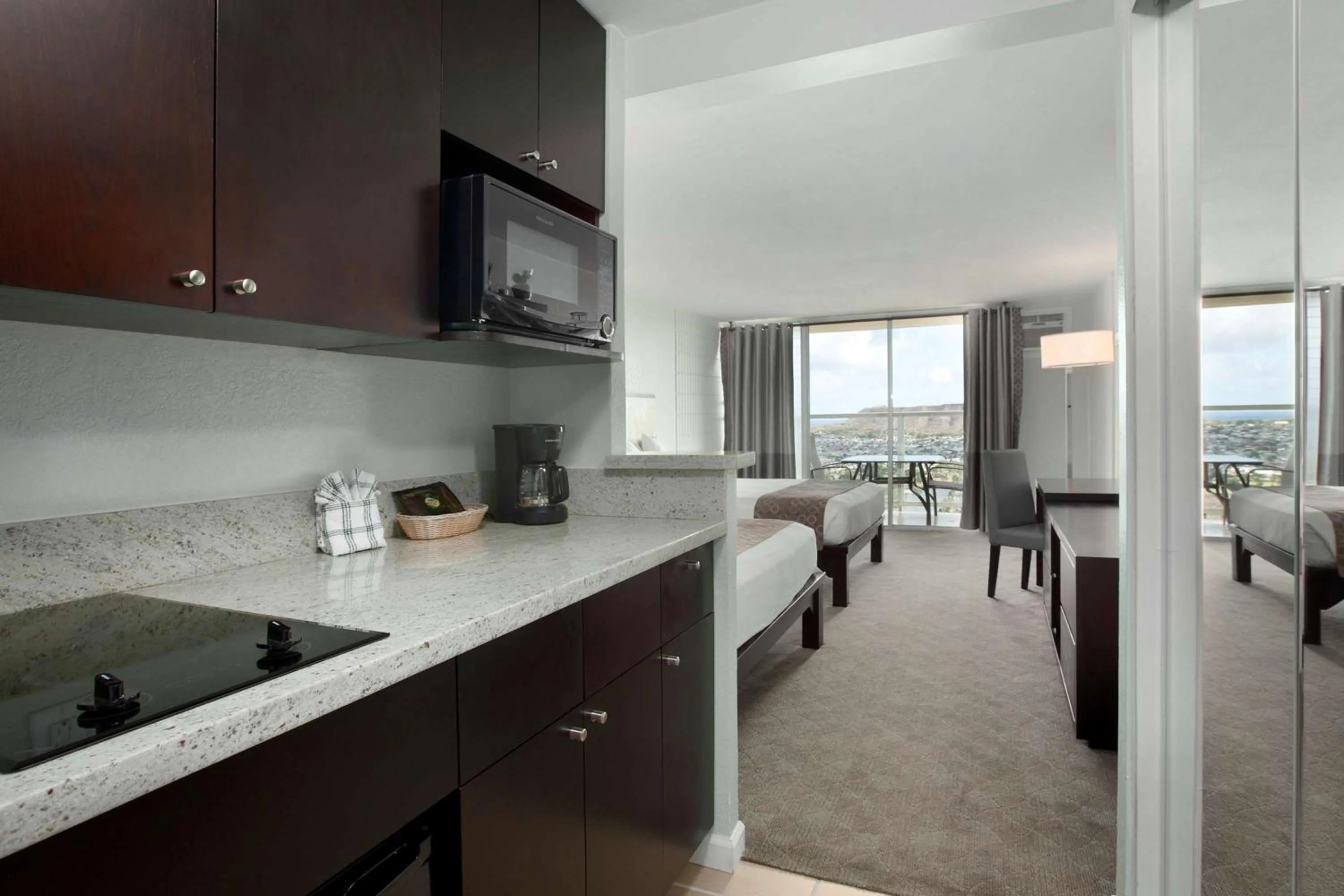 Bed in Skyline Island Colony Hotel