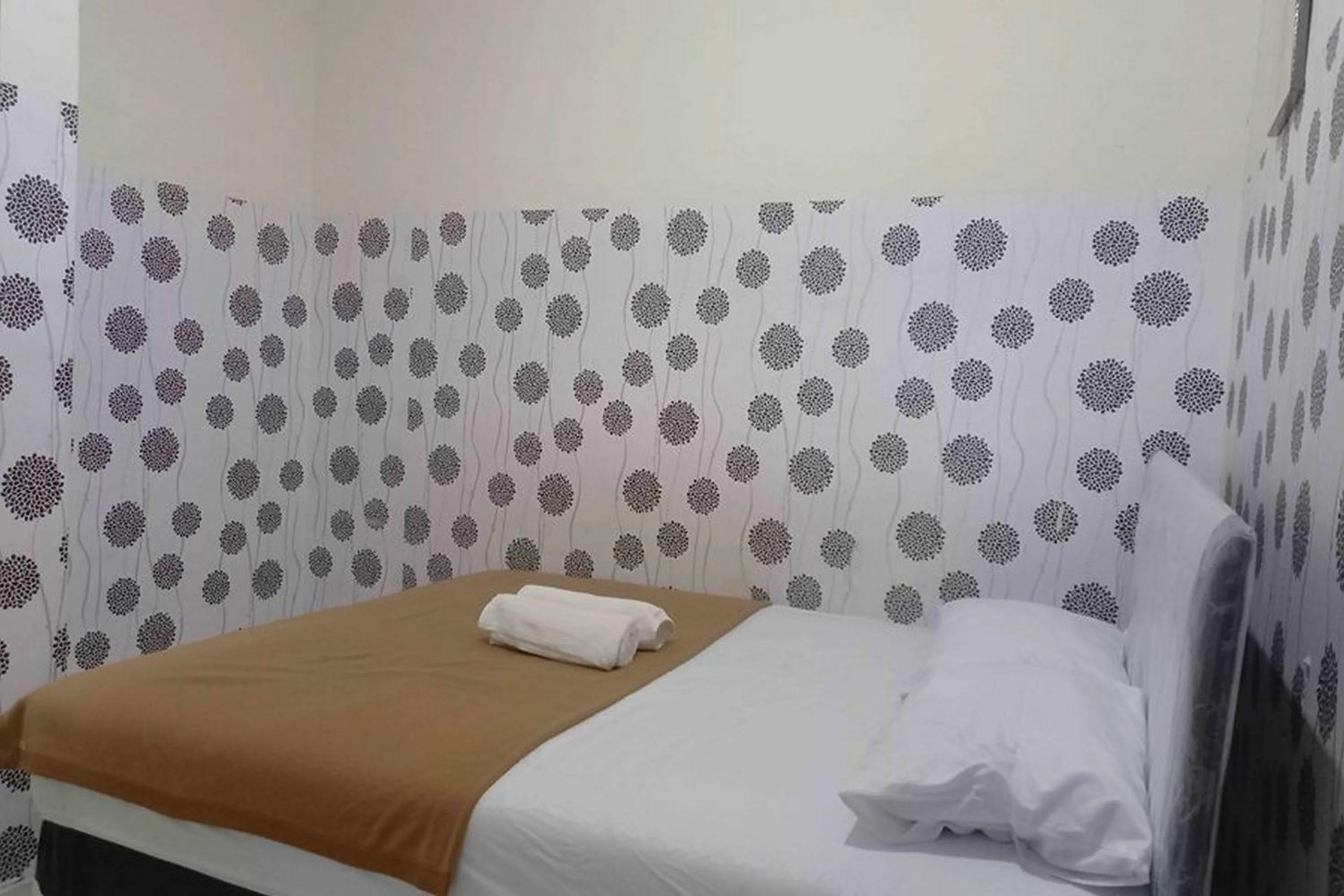 Bed in Omah Jaban Jogja Mitra RedDoorz