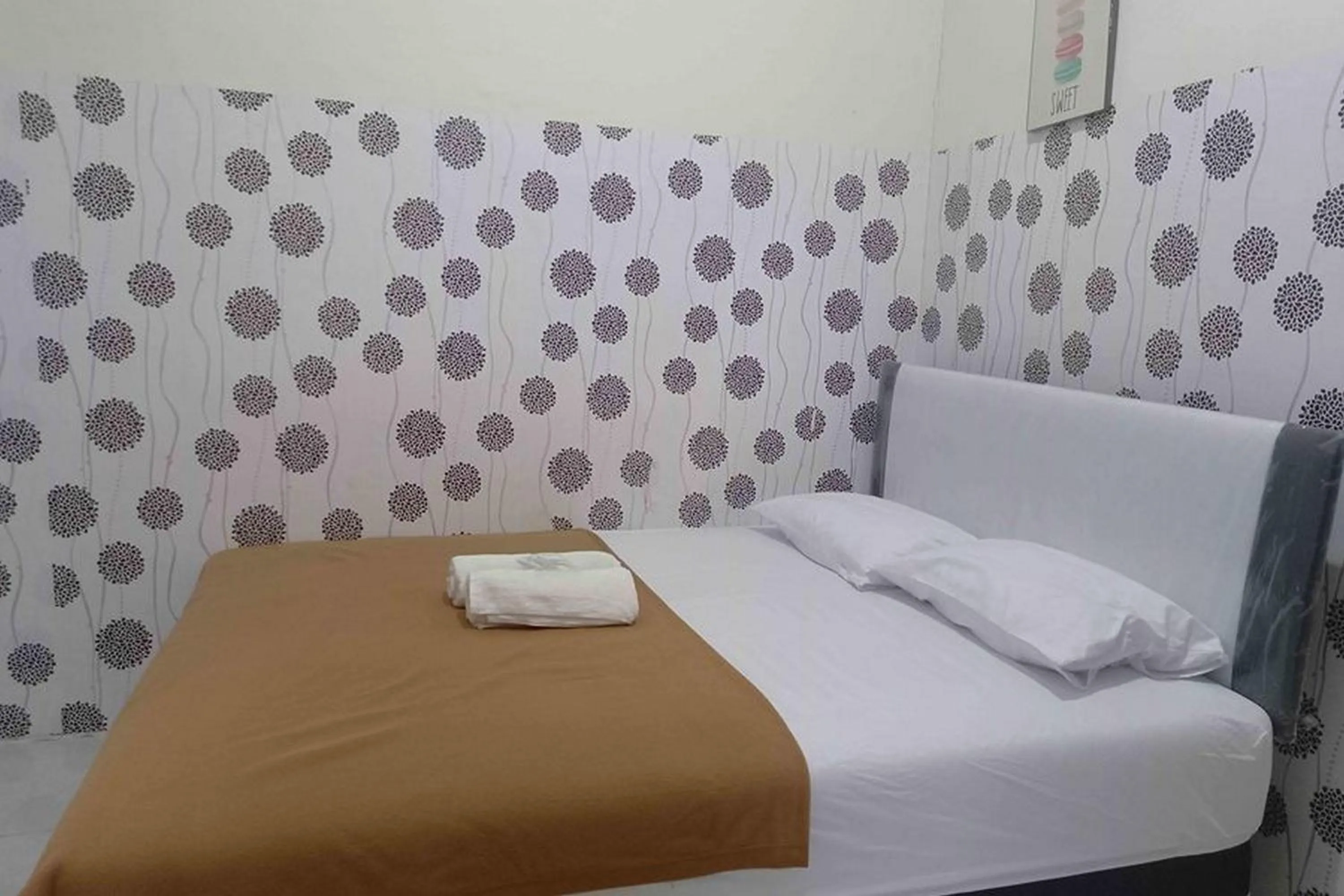 Bed in Omah Jaban Jogja Mitra RedDoorz