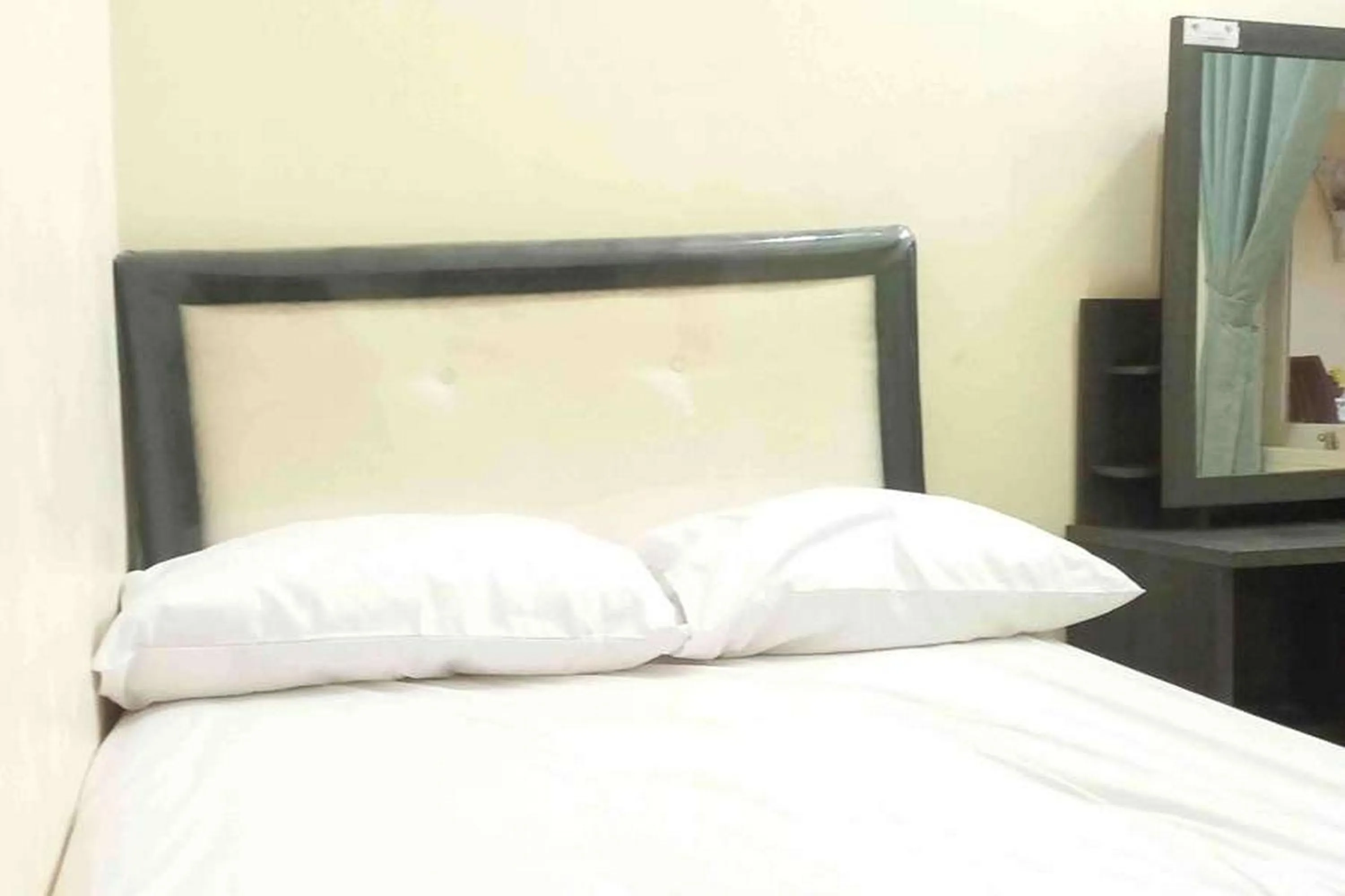 Bed in Omah Jaban Jogja Mitra RedDoorz